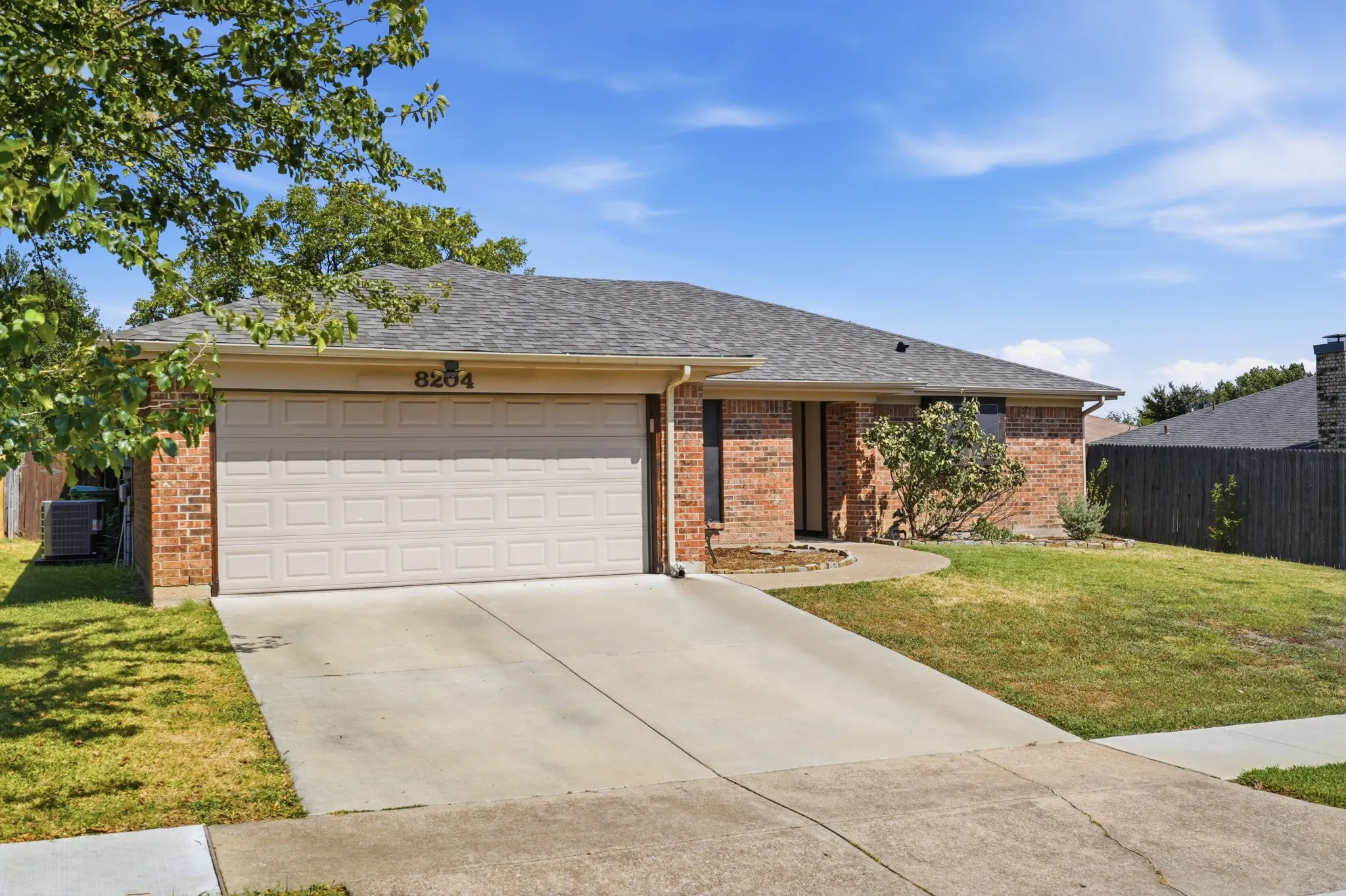 Two Car Garage and newer Driveway