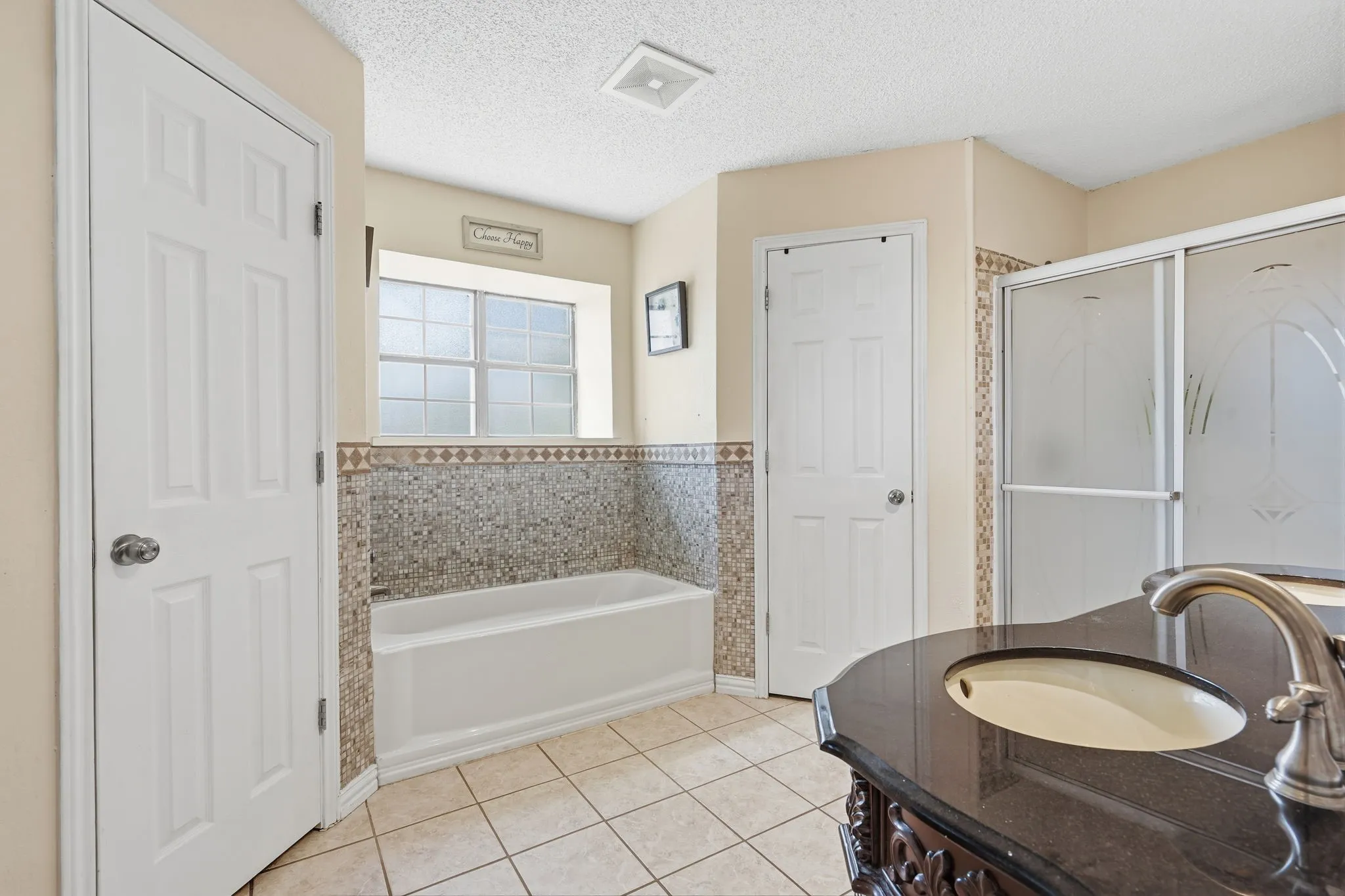 Ensuite bathroom has walk-in Shower, garden Tub and TWO Closets