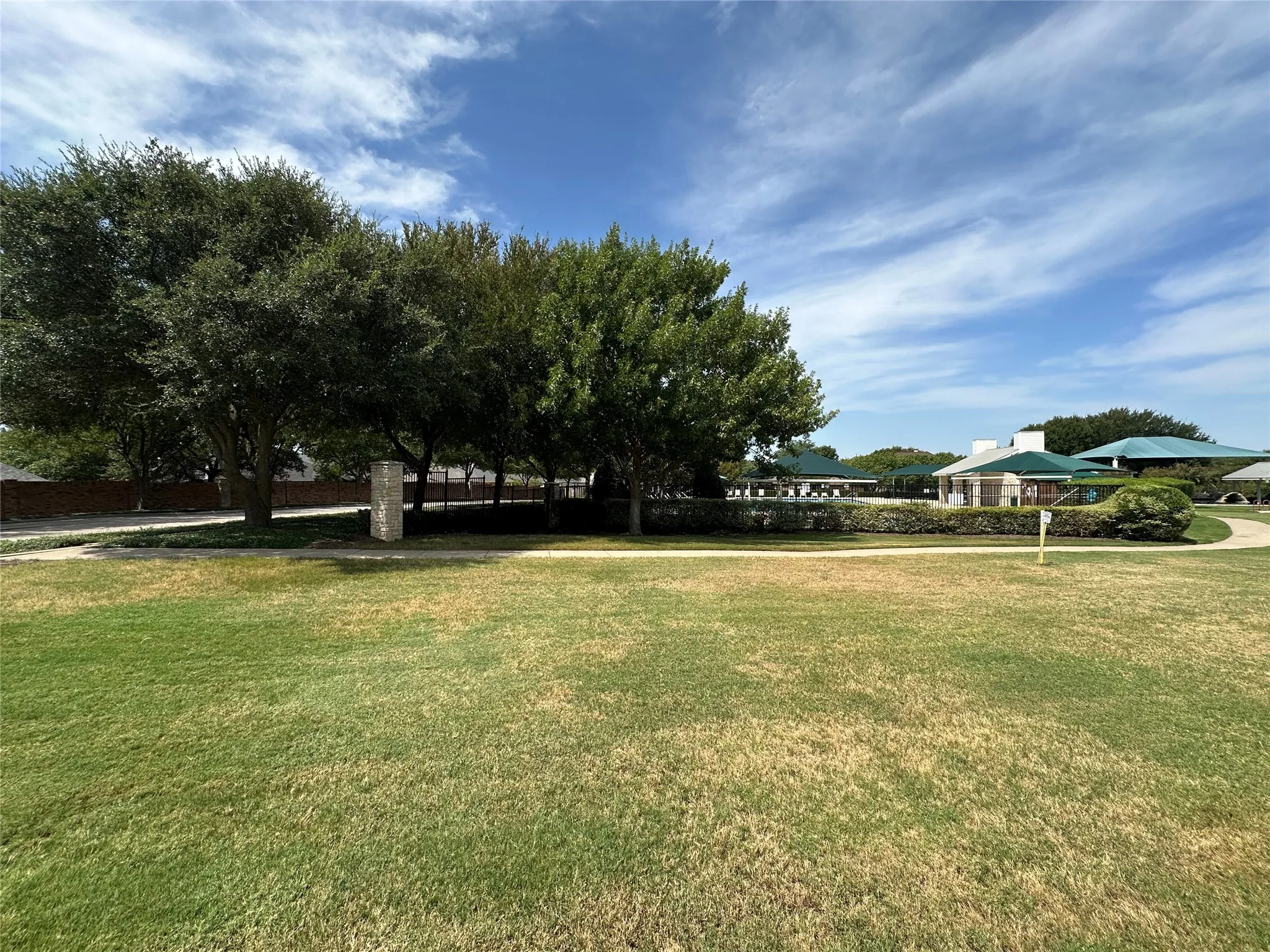 Home backs up to community pool and playground