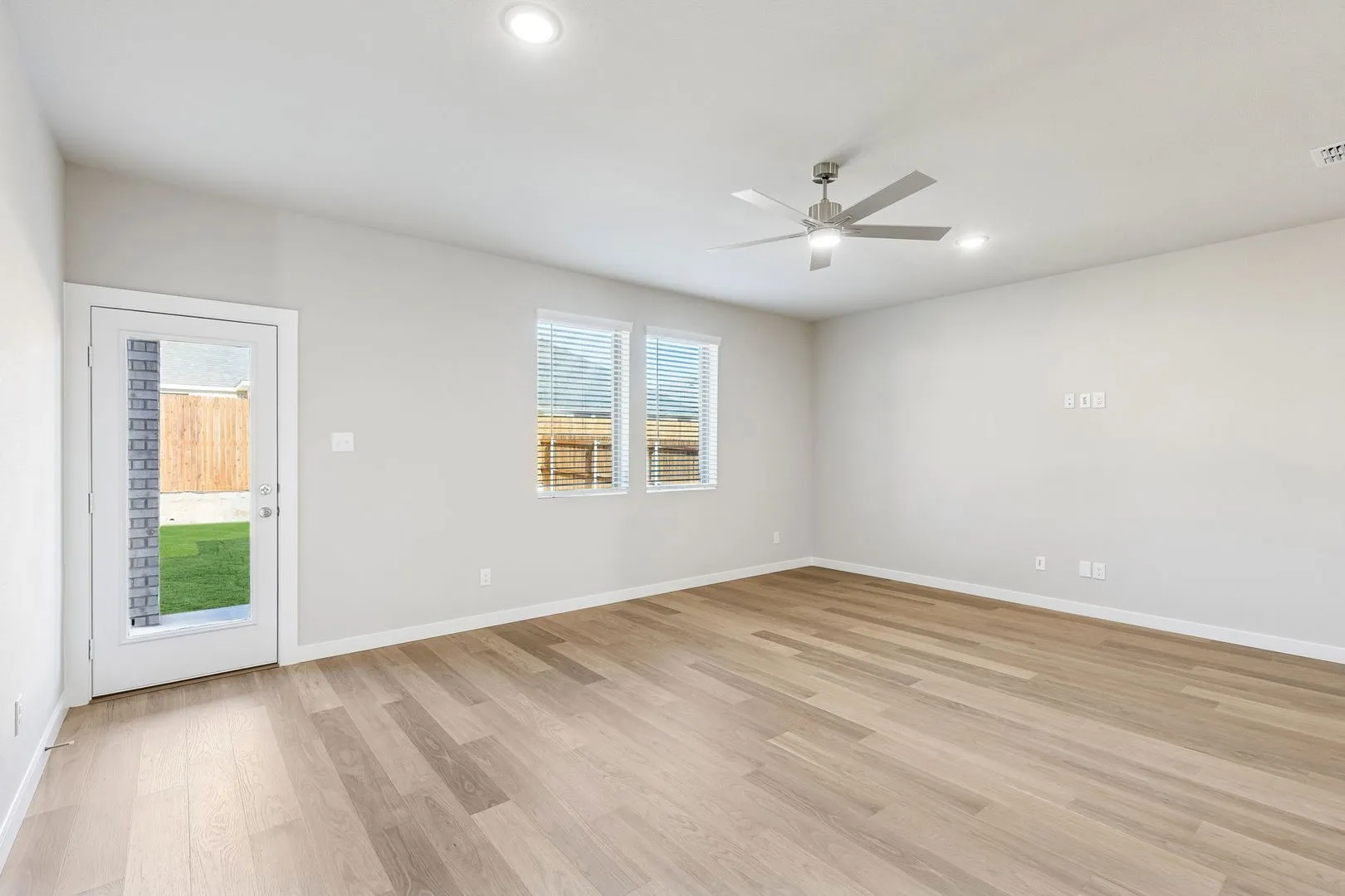 Living Room in the Haylee home plan by Trophy Signature Homes - REPRESENTATIVE PHOTO