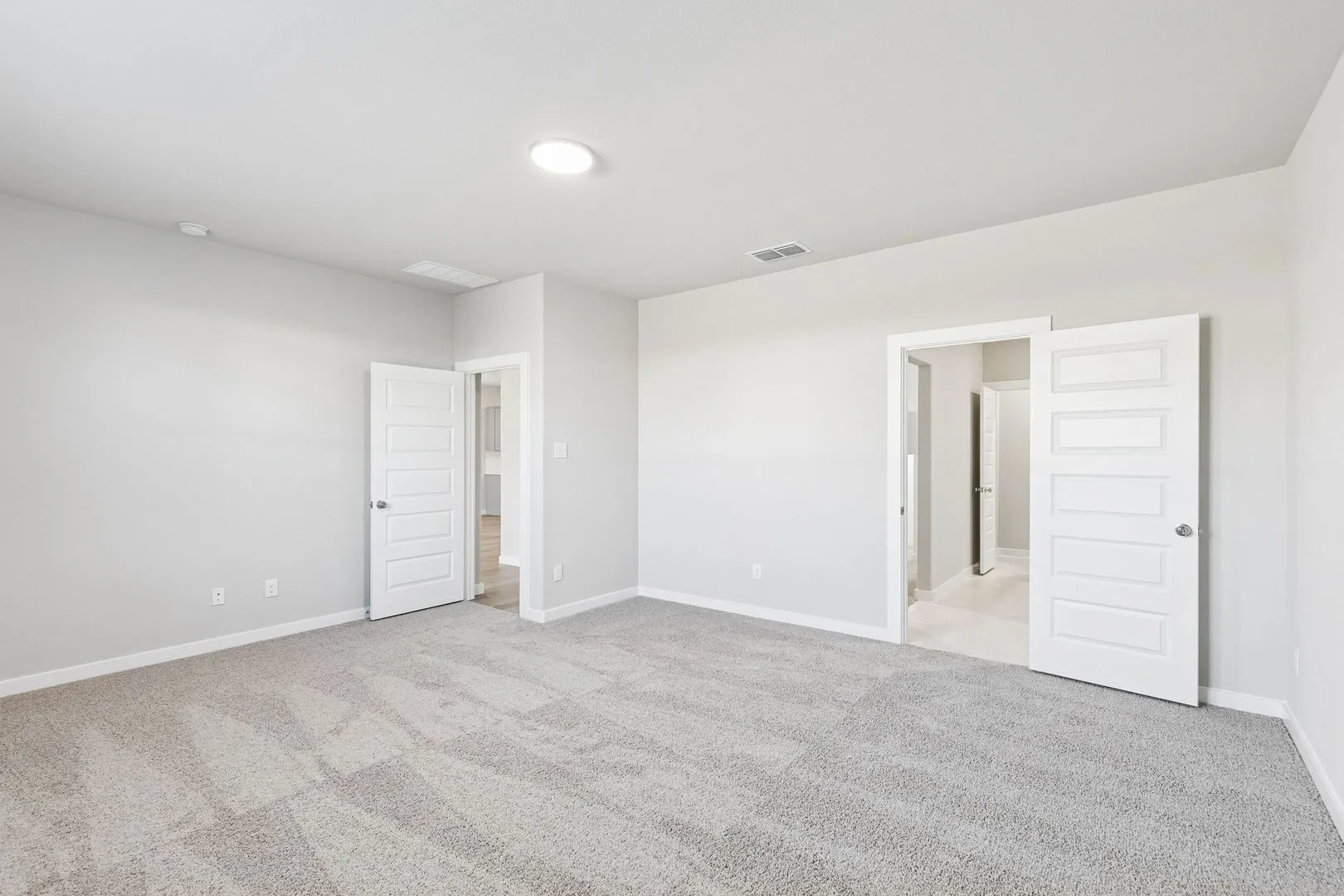 Primary Suite in the Haylee home plan by Trophy Signature Homes - REPRESENTATIVE PHOTO