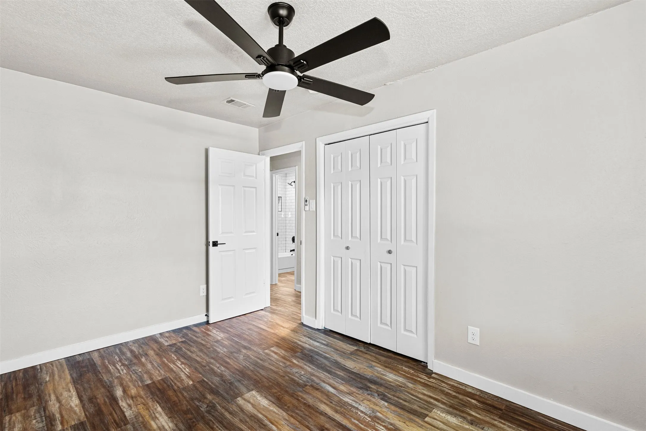 An additional view of one of the bedrooms.