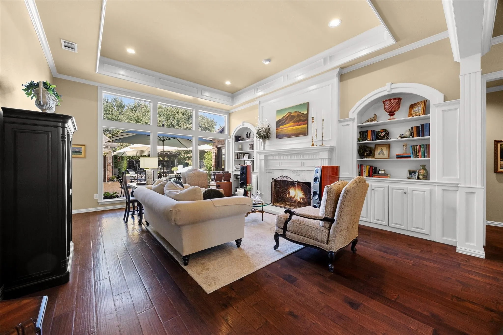 Gorgeous liviing area includes views of pool and outdoor living areas