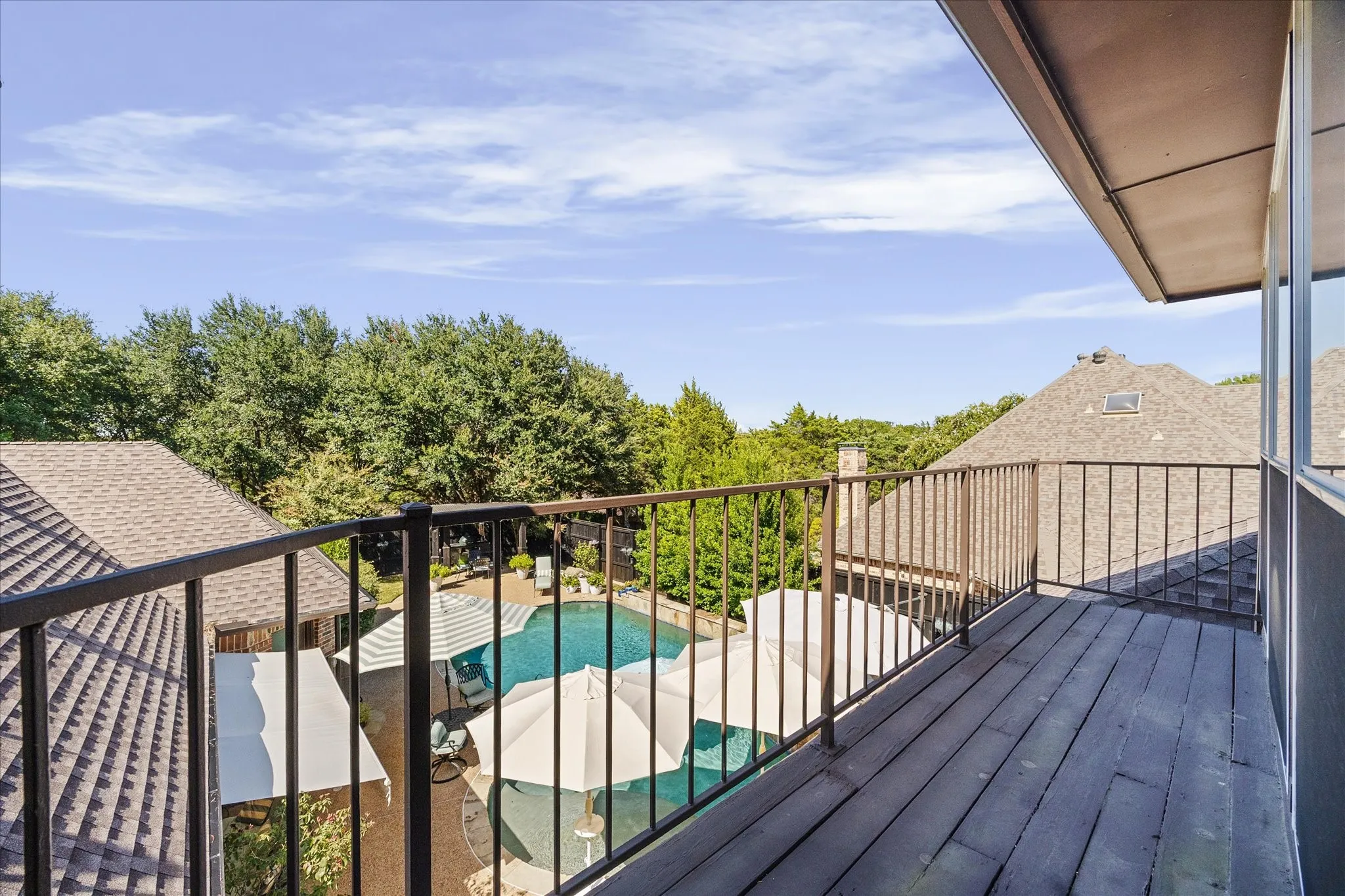 Balcony overlooking private backyard