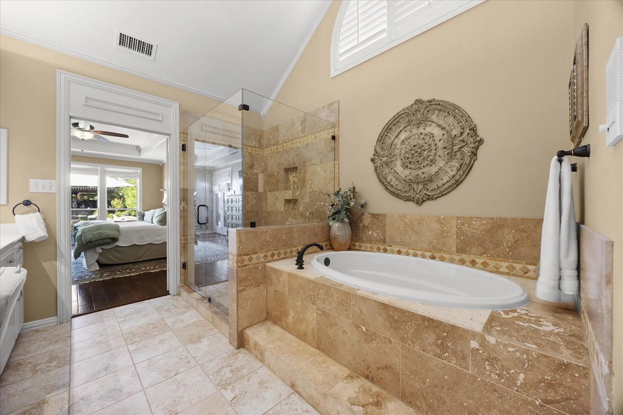 Stunning master bath opens onto master bedroom
