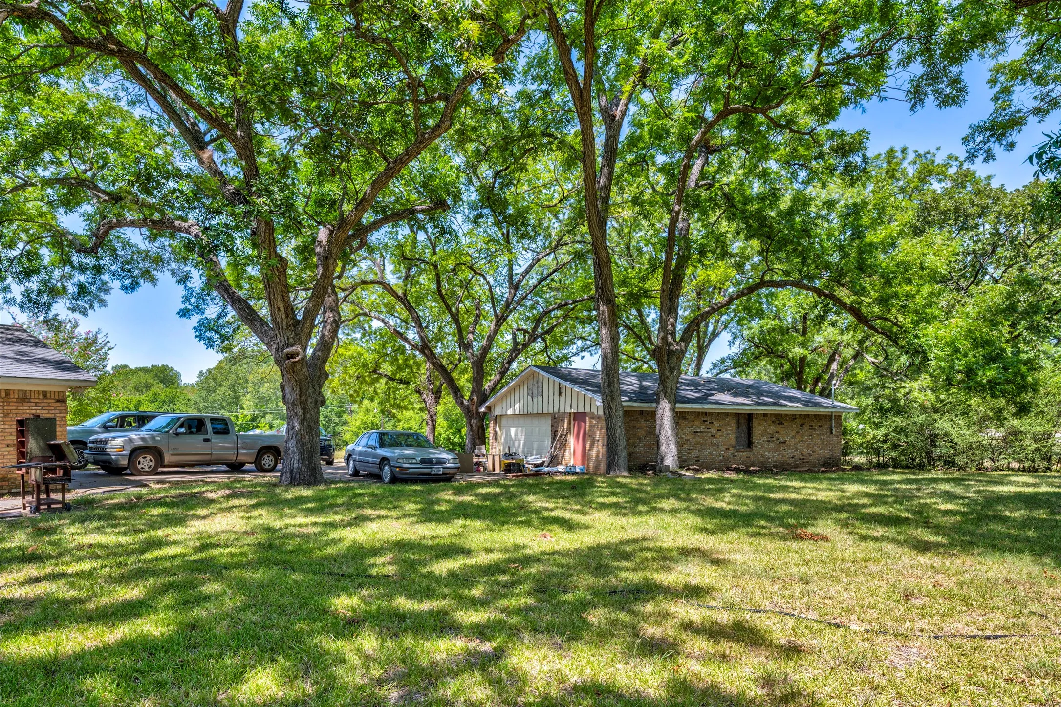 For those needing additional space for hobbies or projects, the detached 2-car garage offers an excellent workshop option allowing the attached 2-car garage to remain available for parking.