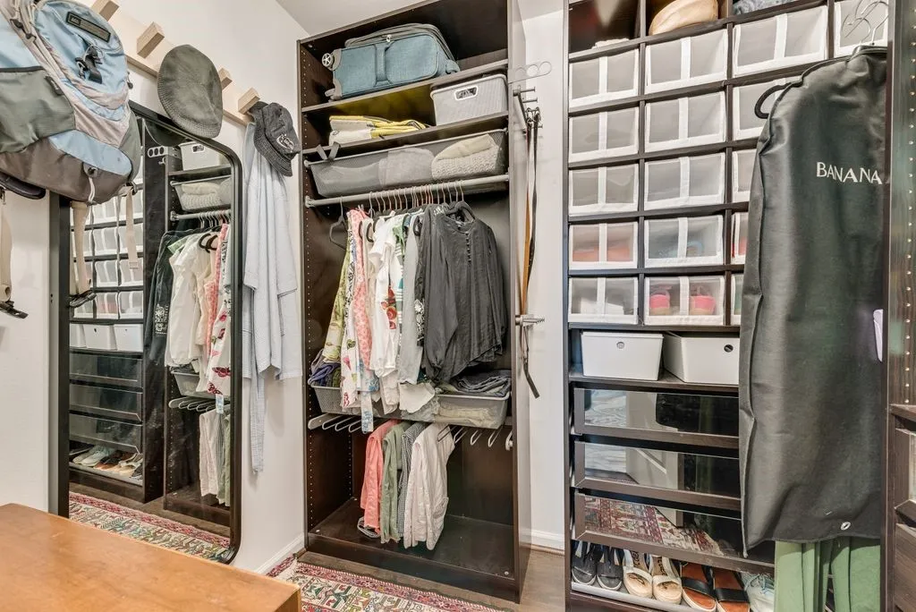 Spacious primary closet.