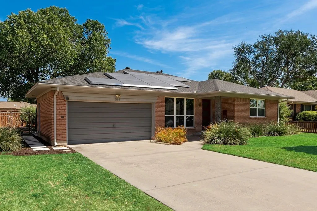 Mid-century ranch with welcoming curb appeal.