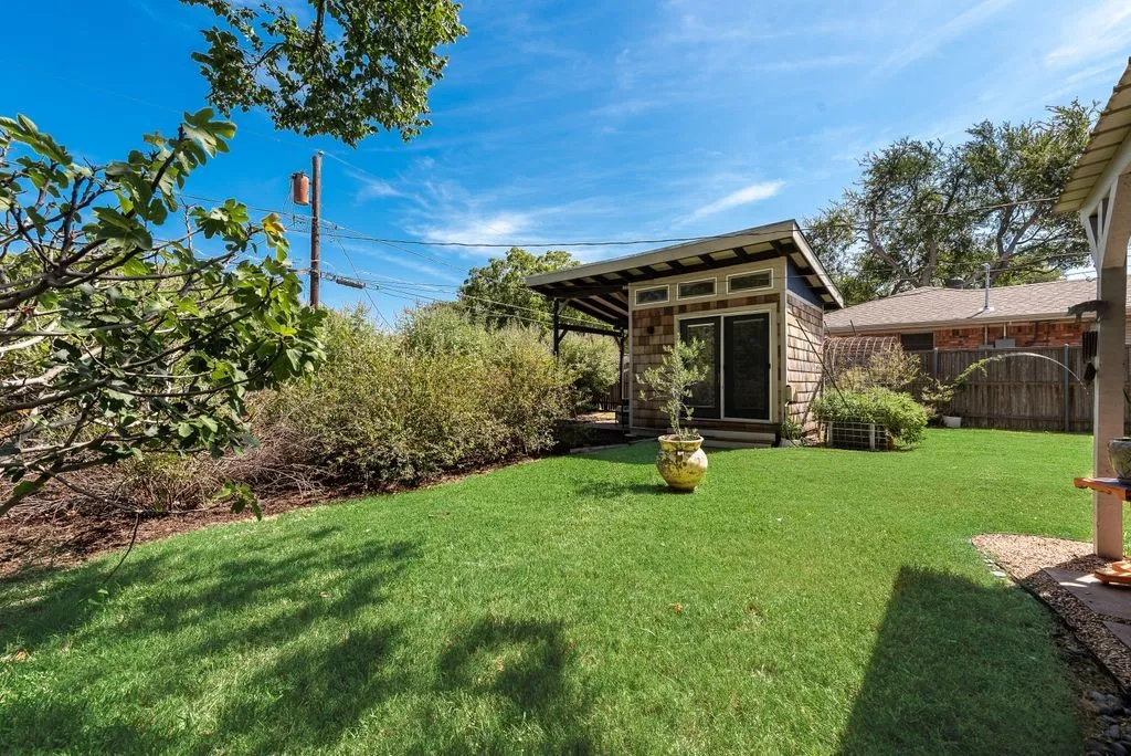 Backyard features a 10x10 stand-alone, termperature controlled studio equipped with electricty. Currently used as an exercise space, it could be great home office, work shop or craft room.