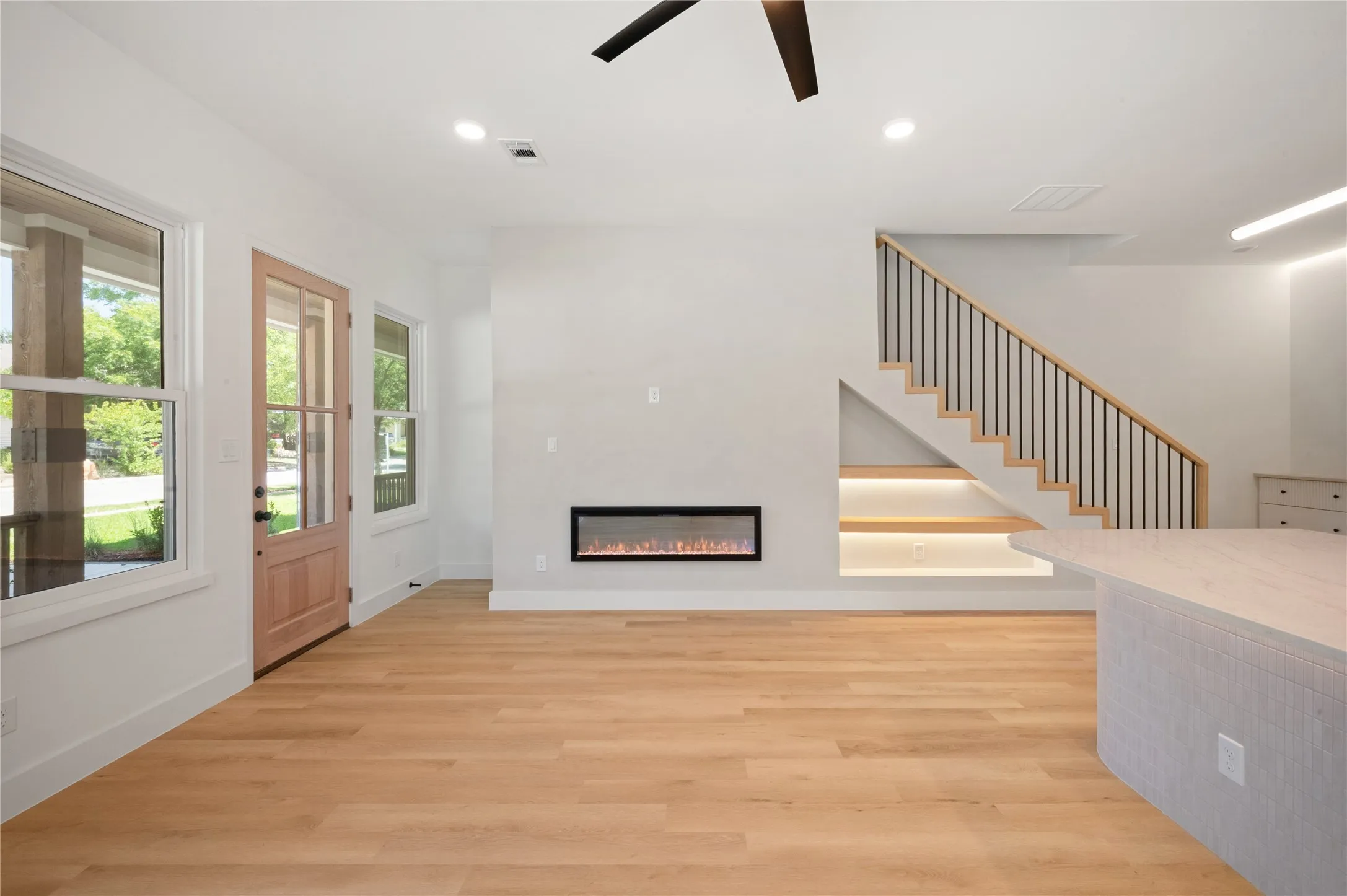 Many windows create natural lighting throughout