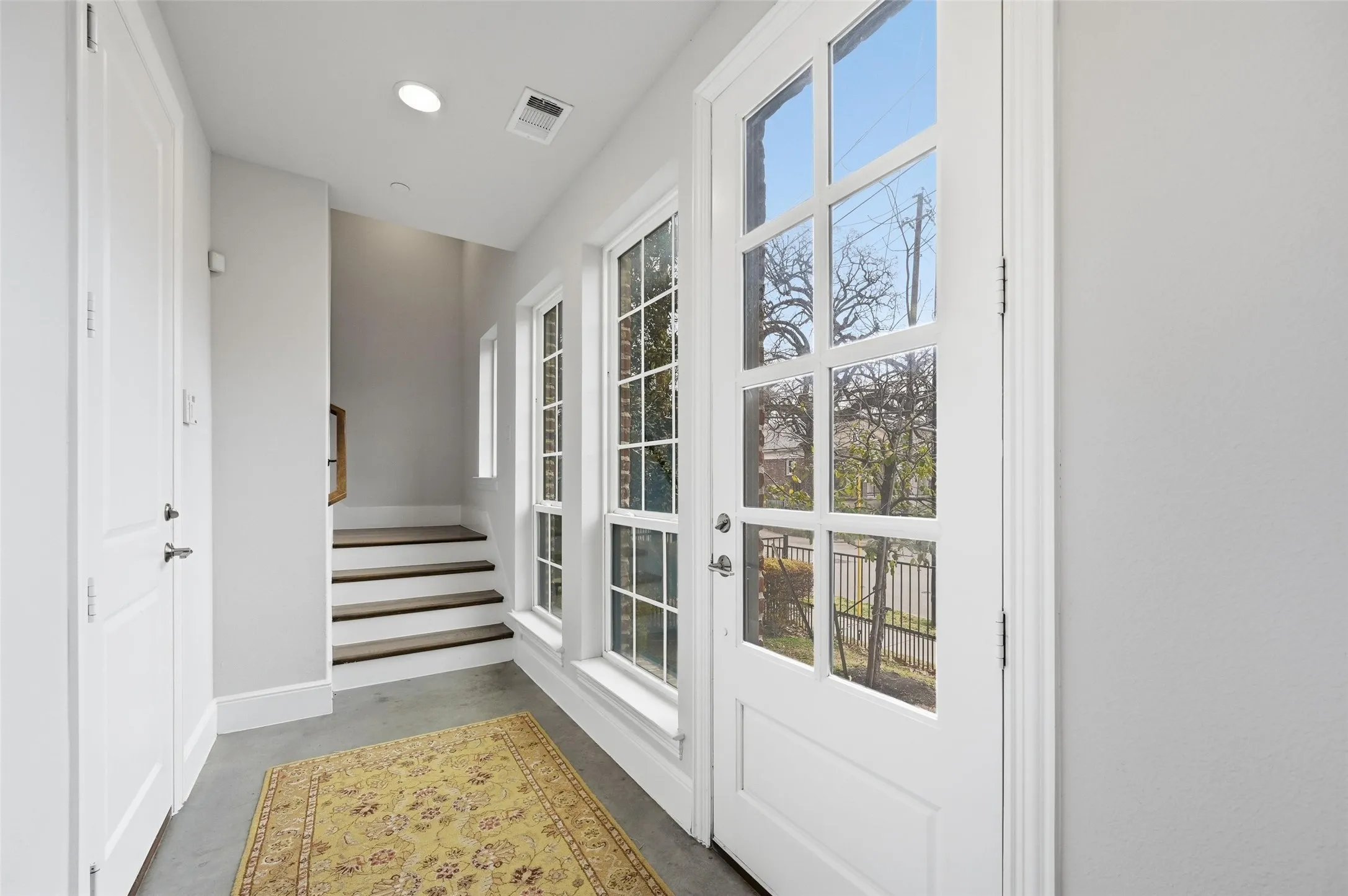 Entry level with coat closet and access to 2-car garage!
