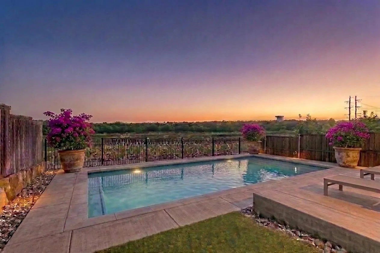 This is a stage photo rendering showing what the home could look like with a swimming pool