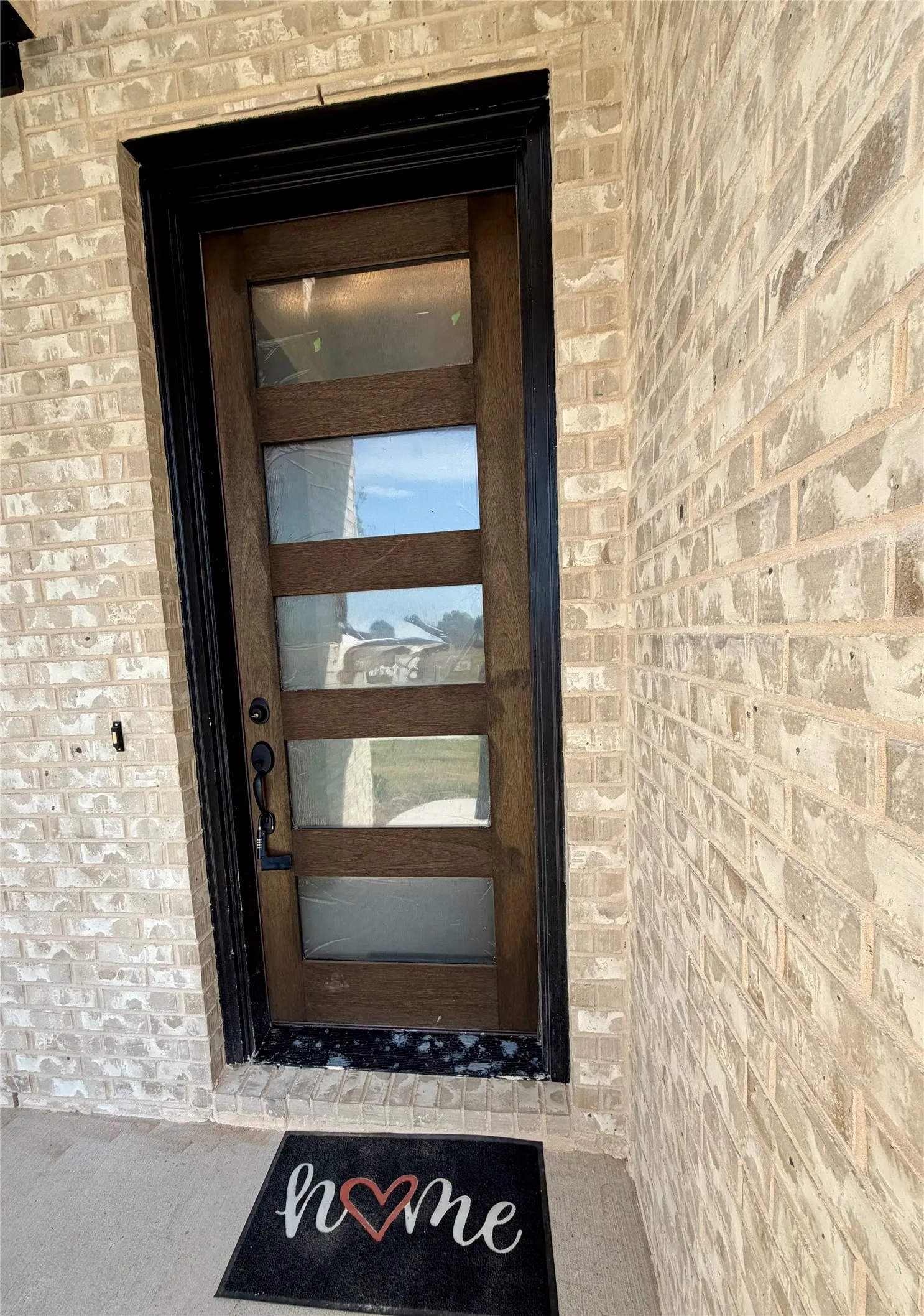 Contemporary 8 ft door makes a great forst impression