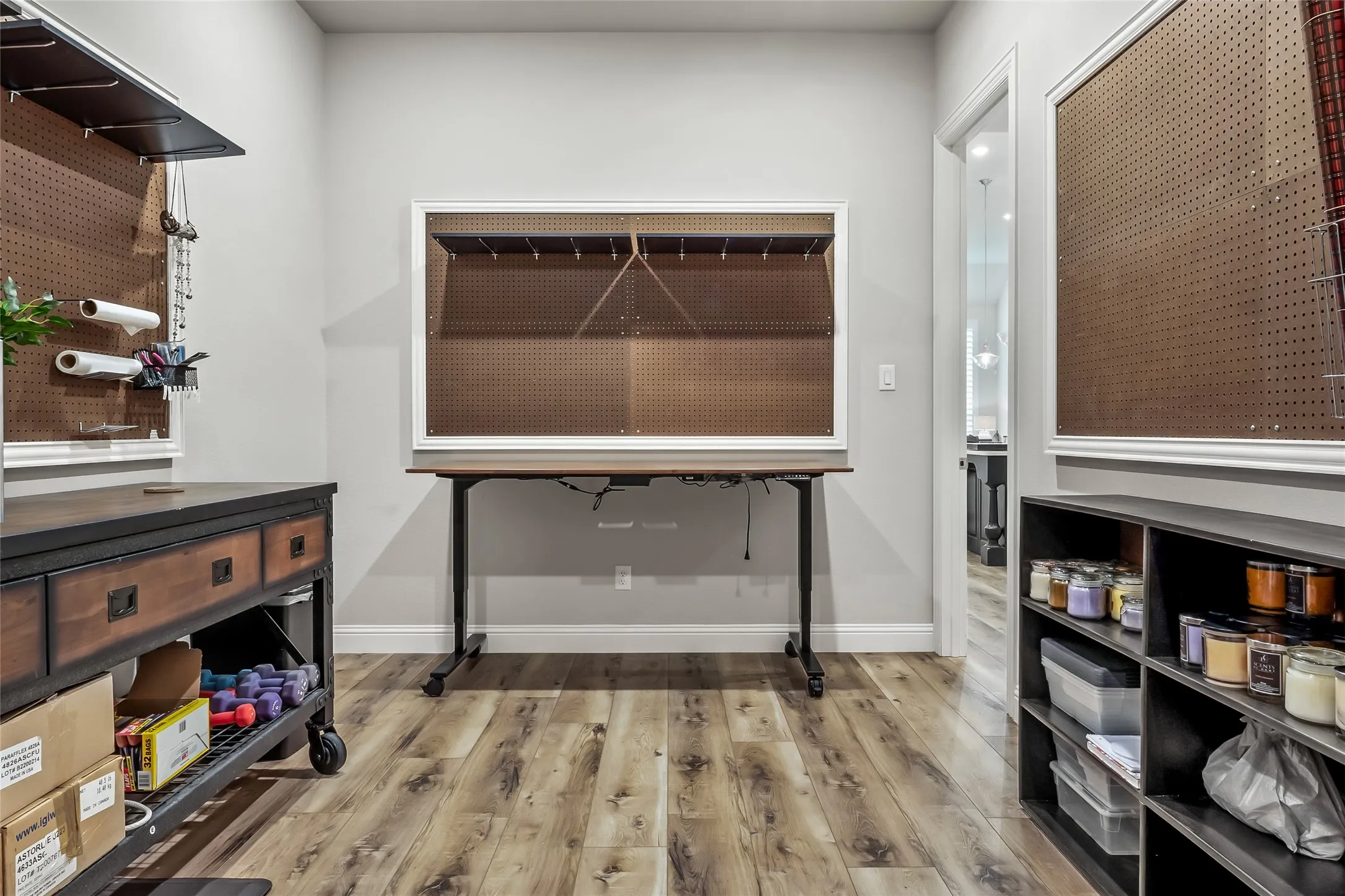 Miscellaneous room with hardwood / wood-style flooring