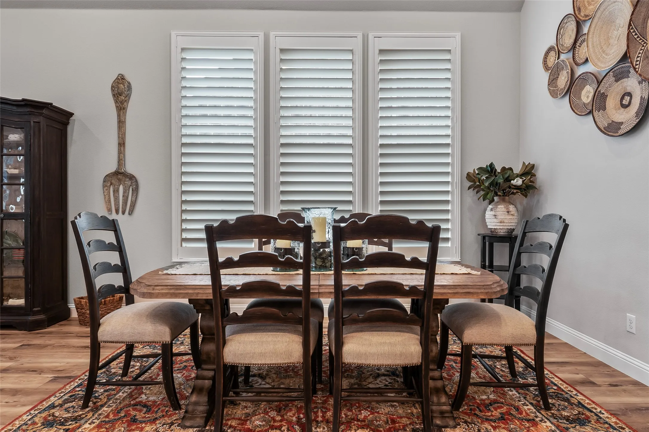 Dining area with hardwood / wood-style flooring