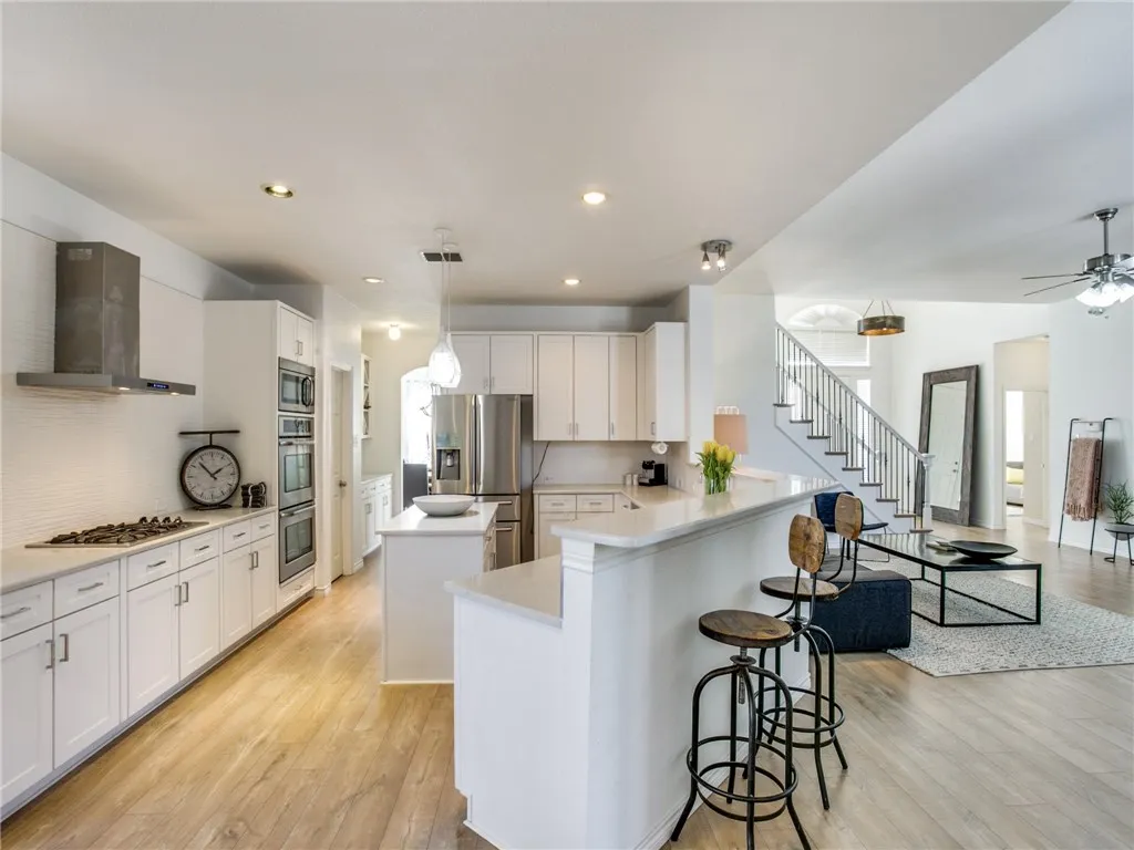Fabulous Kitchen Is Fully Equipped And Opens To The Family Room.