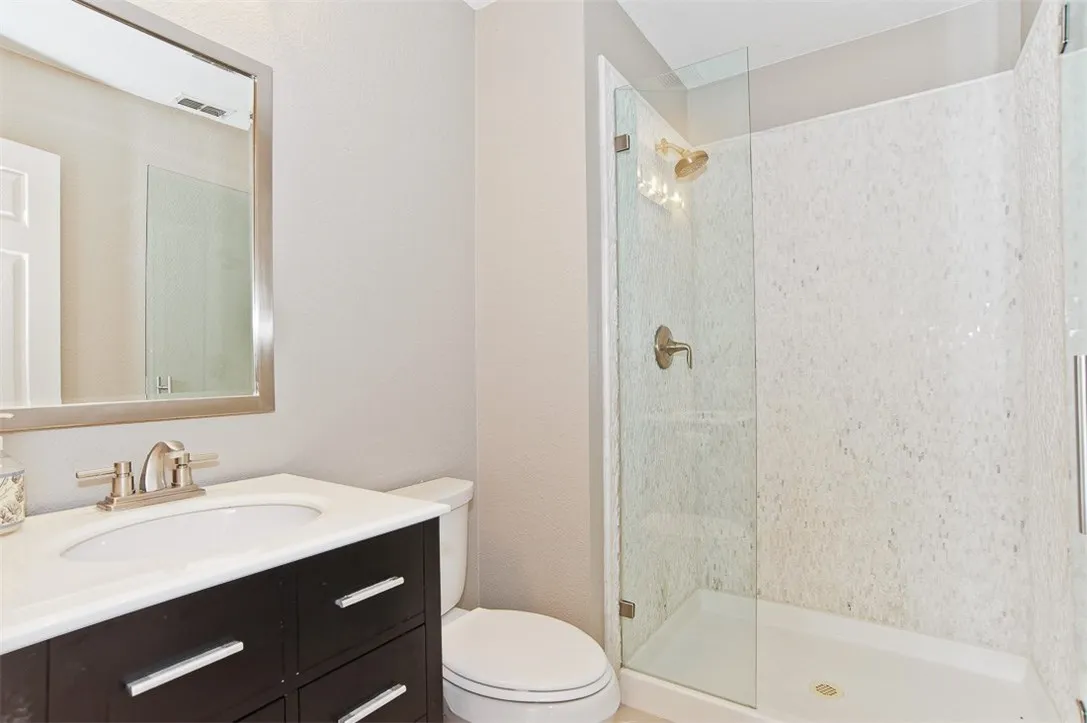 Downstairs Full Bath Sits Off Study/5th Bedroom Area.
