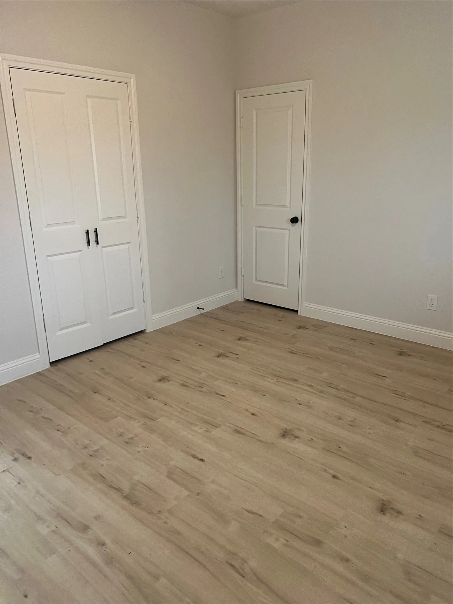 Wood-finish flooring throughout