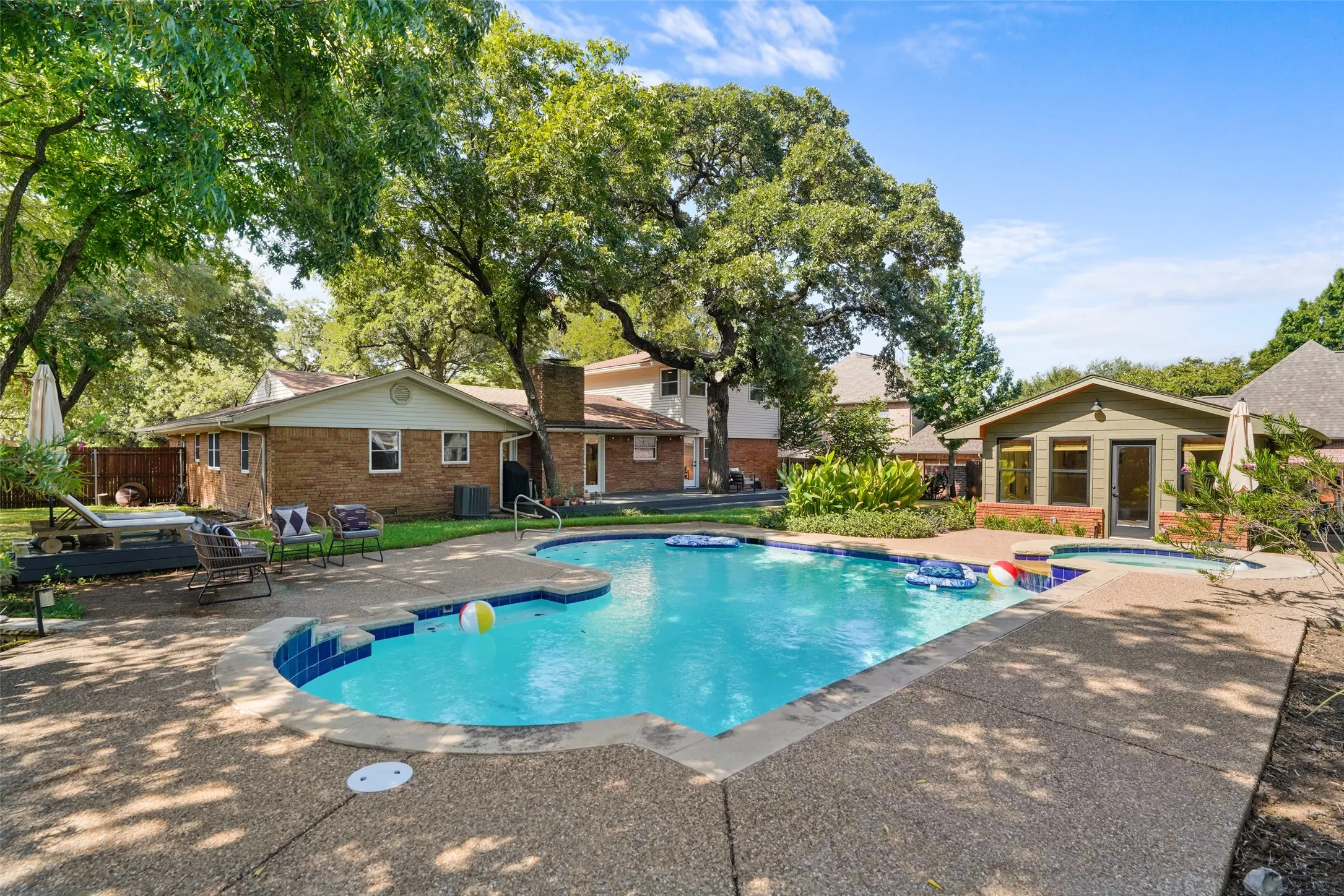 Heated pool overlooking the detached poolside studio