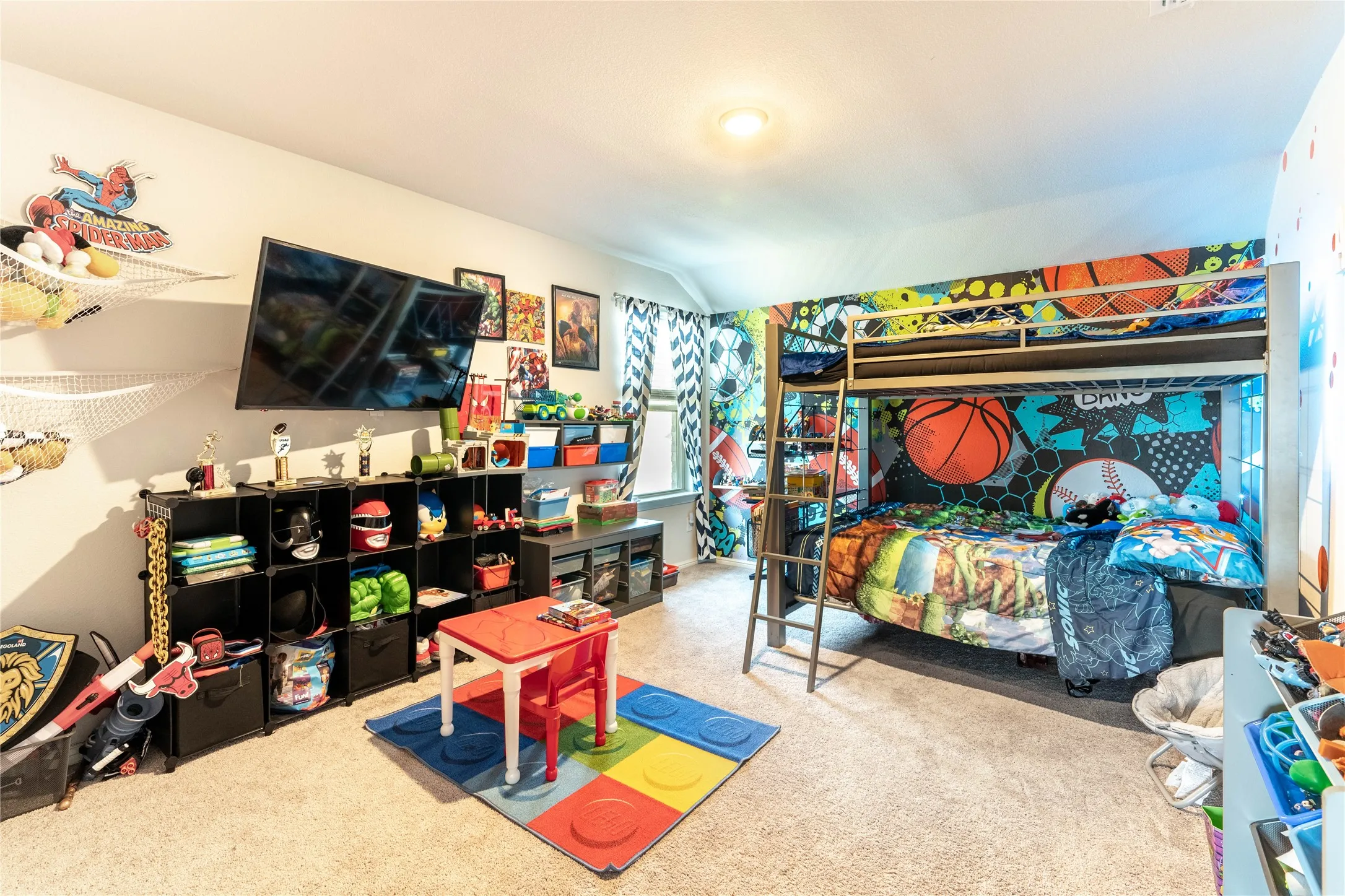 Wall-mounted shelving units, built-in bunk bed, and carpeted flooring