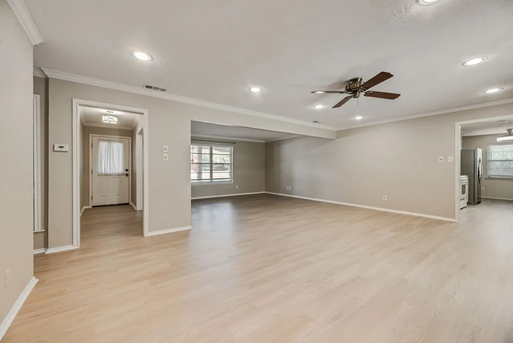 Fresh, neutral interiors and brand-new LVP flooring throughout create a bright, cohesive feel, while the open layout provides plenty of flexibility for everyday living and entertaining.
