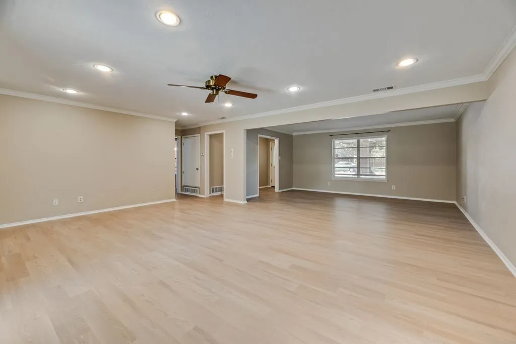 The two generous living areas flow seamlessly together, creating plenty of room to spread out, entertain or design separate gathering spaces. Fresh paint and brand-new LVP flooring give the home a clean, move-in-ready feel.