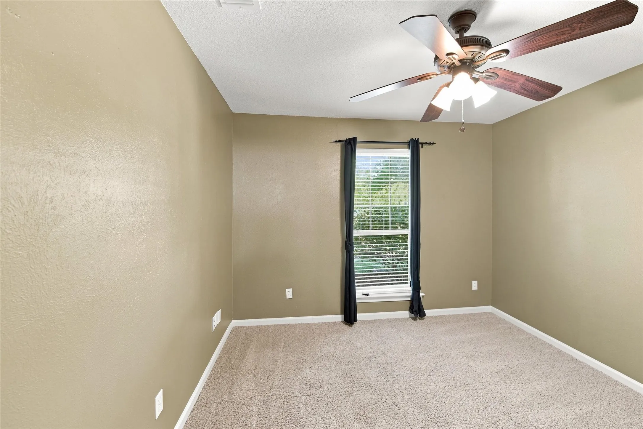 Corner bedroom view of window.