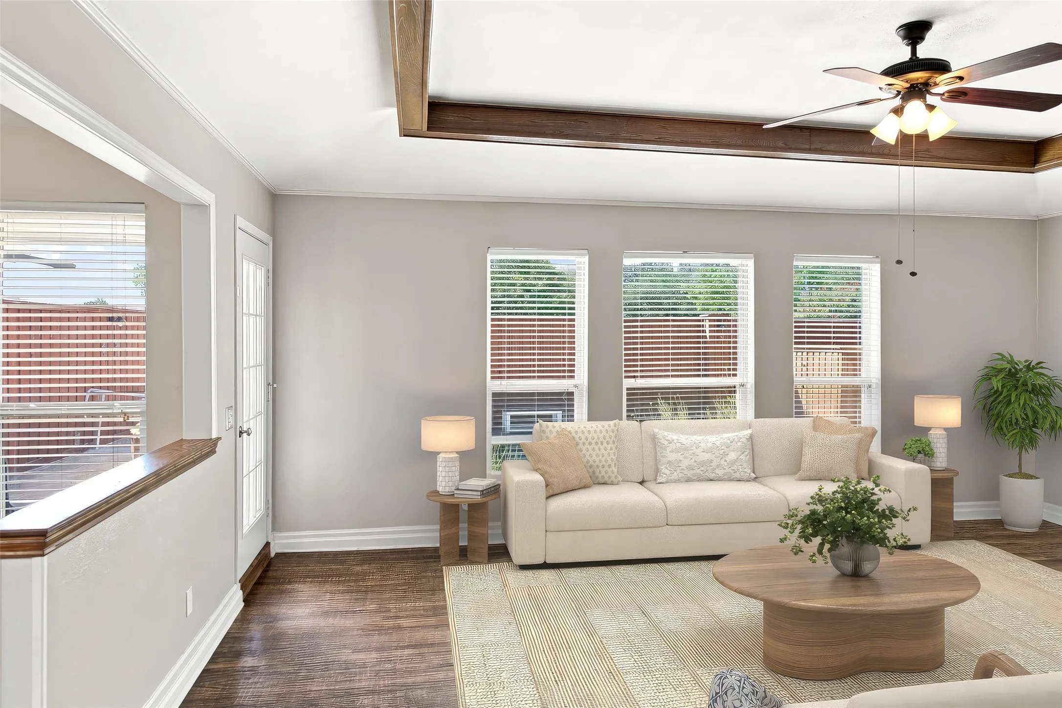 Virtually staged family room overlooks the pool!