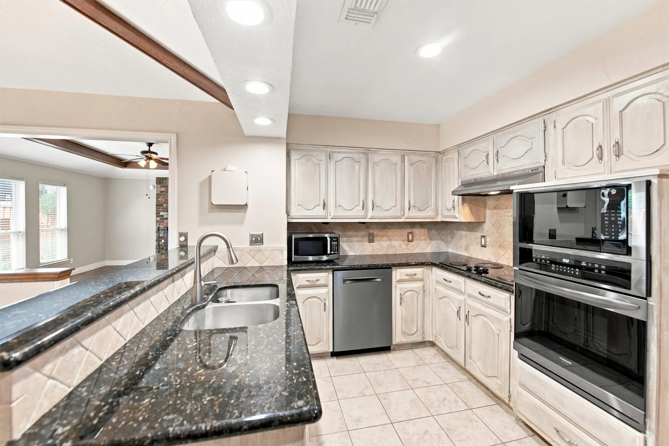 Granite counter tops and convection oven.