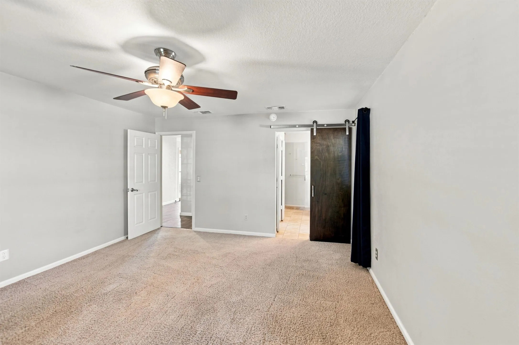 View towards the primary bathroom.