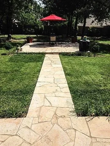 Flagstone covered patio and walkway to open patio area