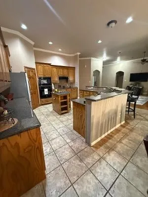 Large Kitchen Open to the Living Area with an Island and Breakfast Bar.