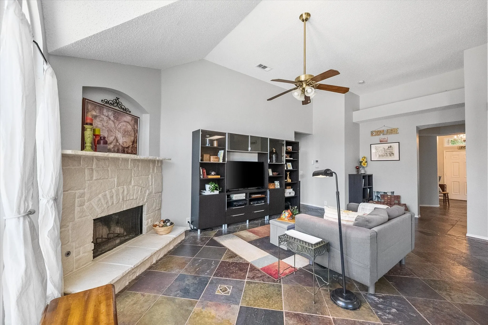 Gorgeous fireplace adds plenty of charm to the living room