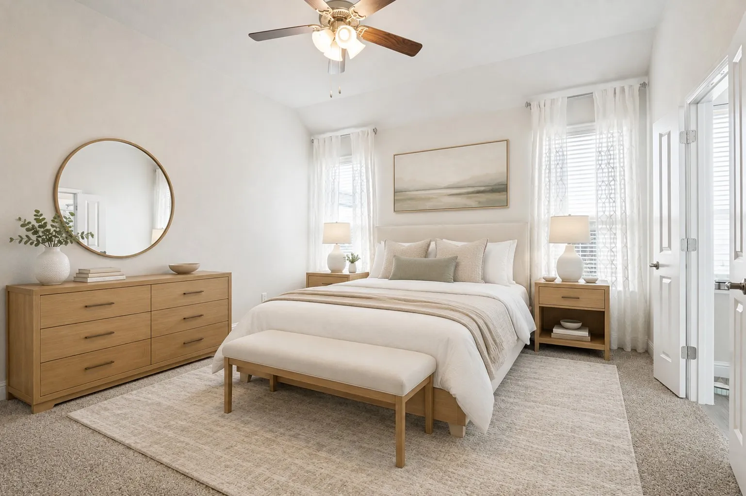 **Virtually staged for effect**Light-toned carpeting with a ceiling fan, dual windows with blinds, and white painted doors