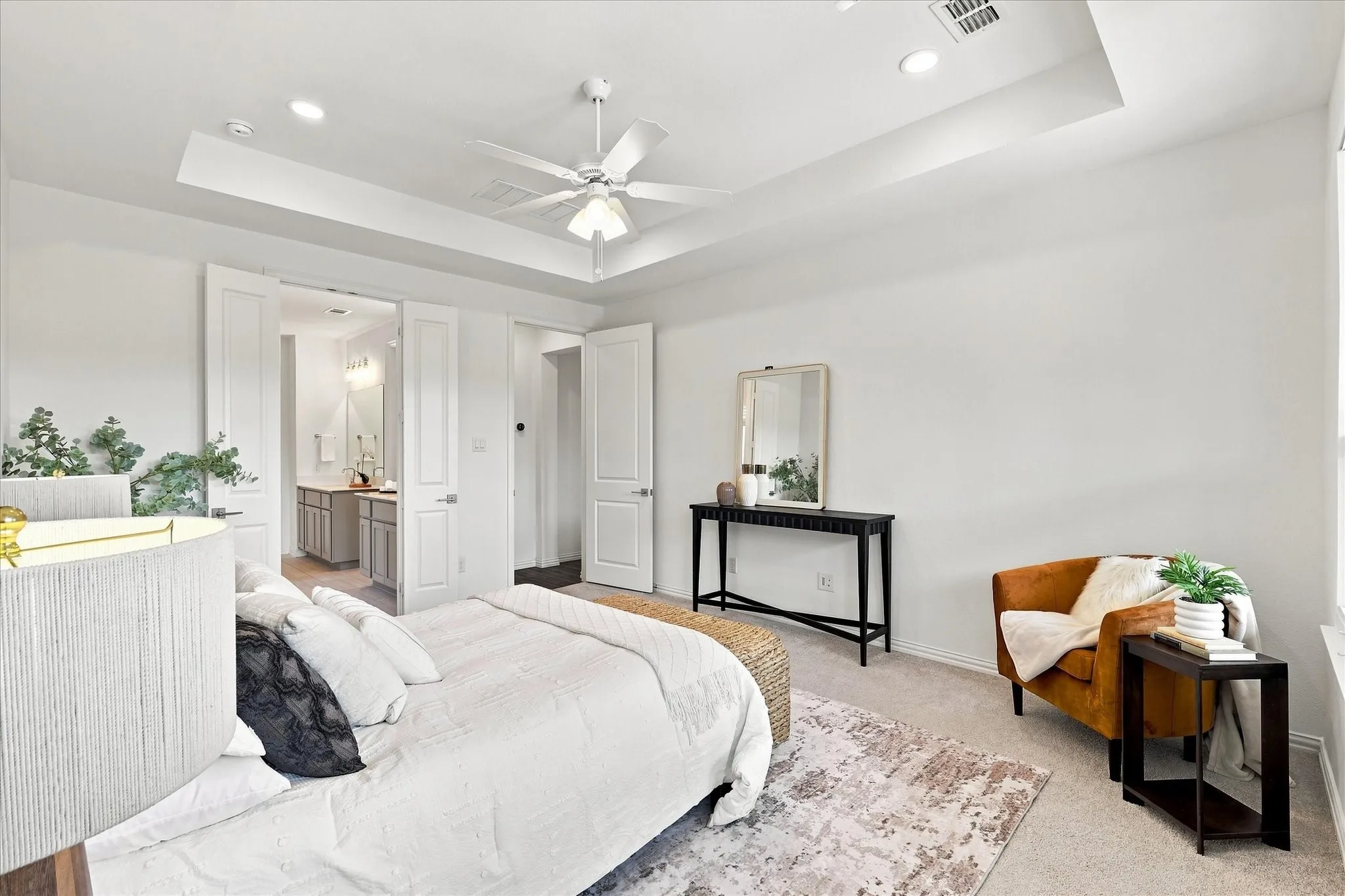 Recessed lighting, tray ceiling, and ceiling fan