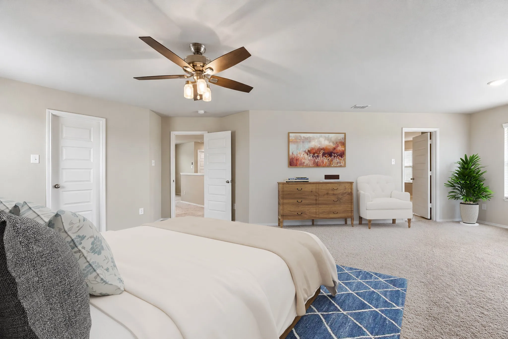 The oversized primary suite includes an unusually generous sitting area.