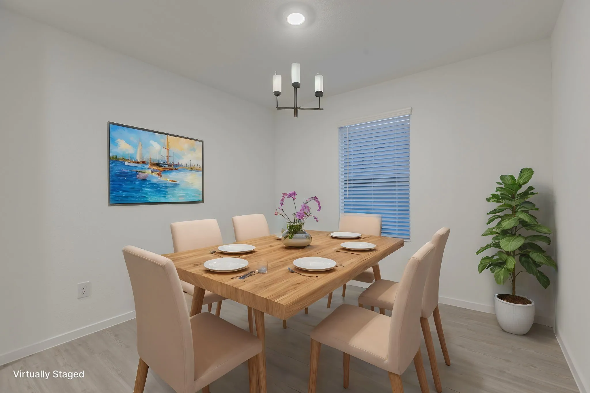 Dining room with light hardwood / wood-style floors