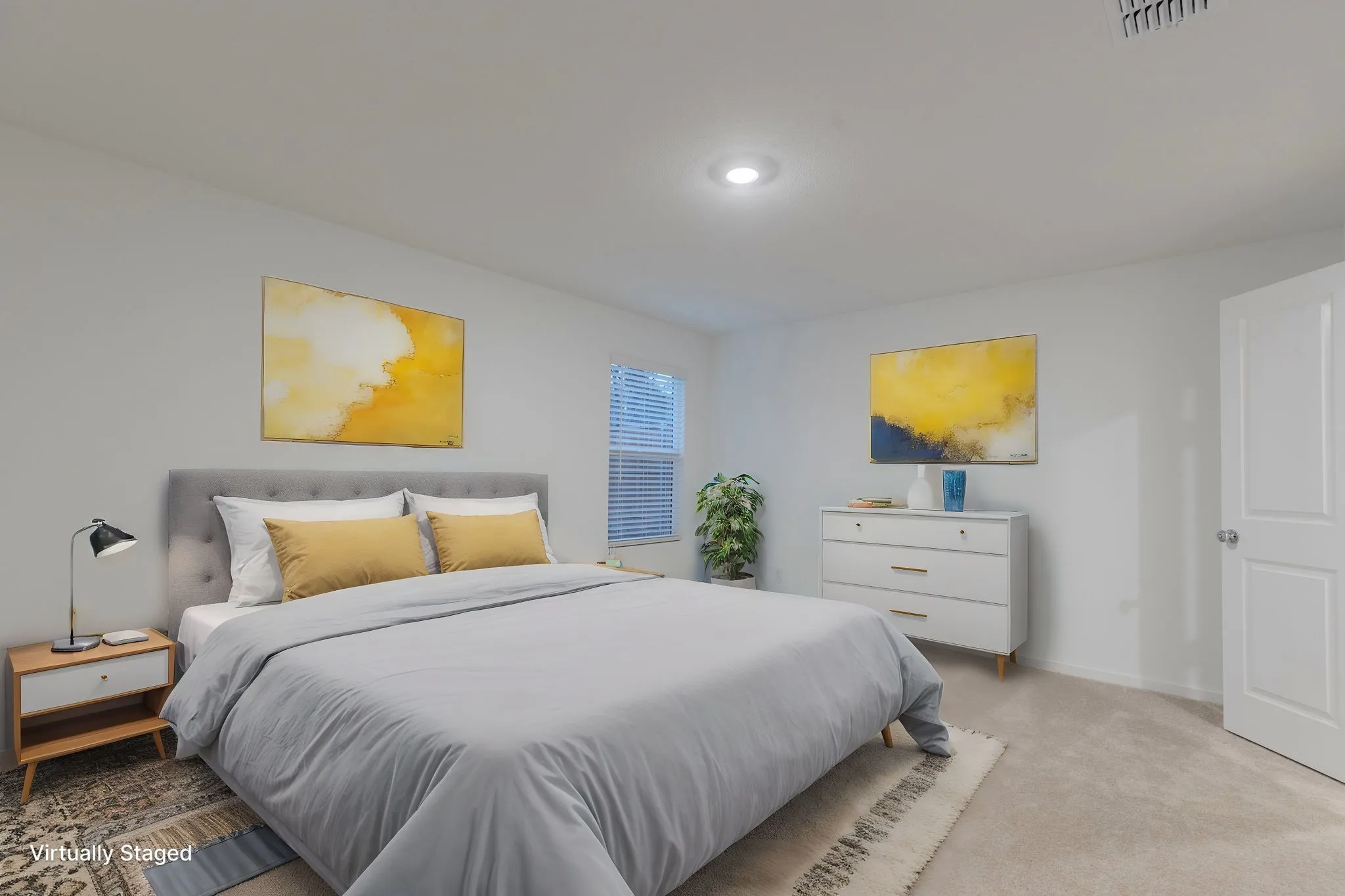 Bedroom with light carpet