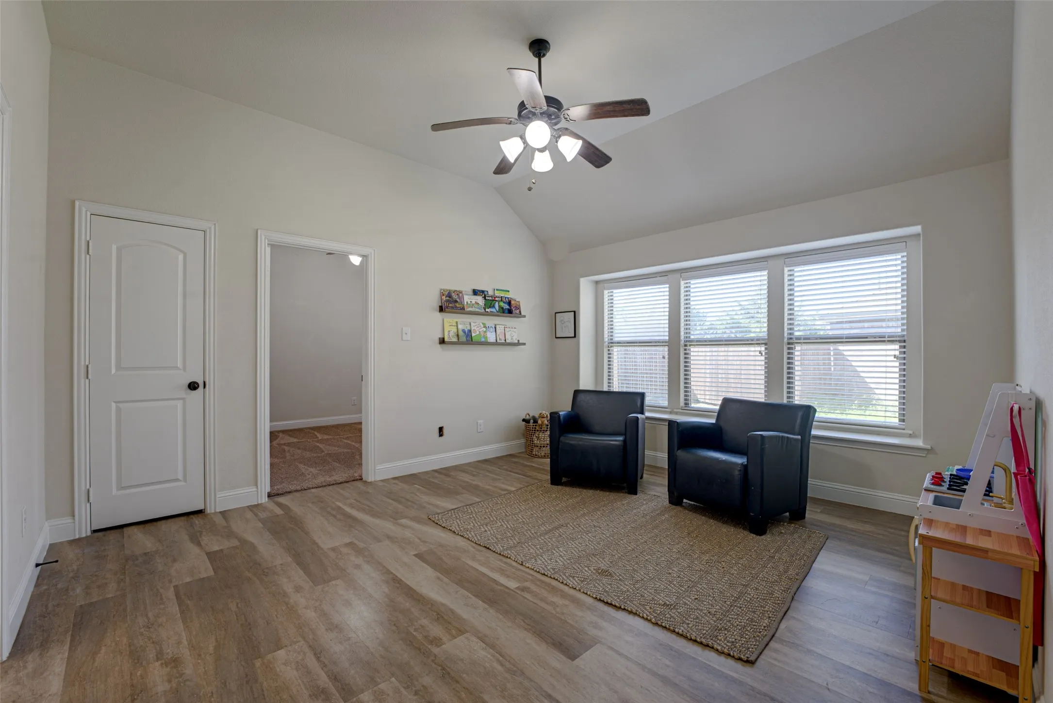 Other view of Game Room. Two secondary bedrooms are each on opposite side of game room.