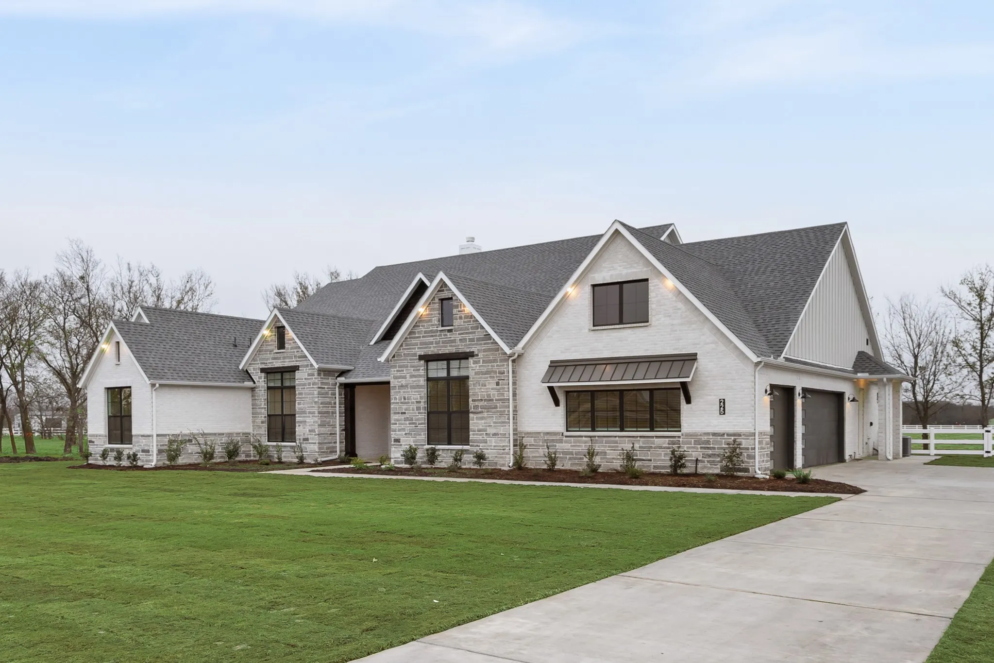Custom Greenbrier Home with side entry three car Garage!