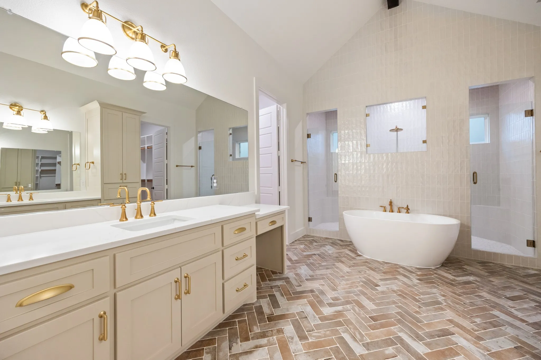 Bathroom with stall Shower, free standing soaking Tub, & high vaulted ceiling and decorative flooring!