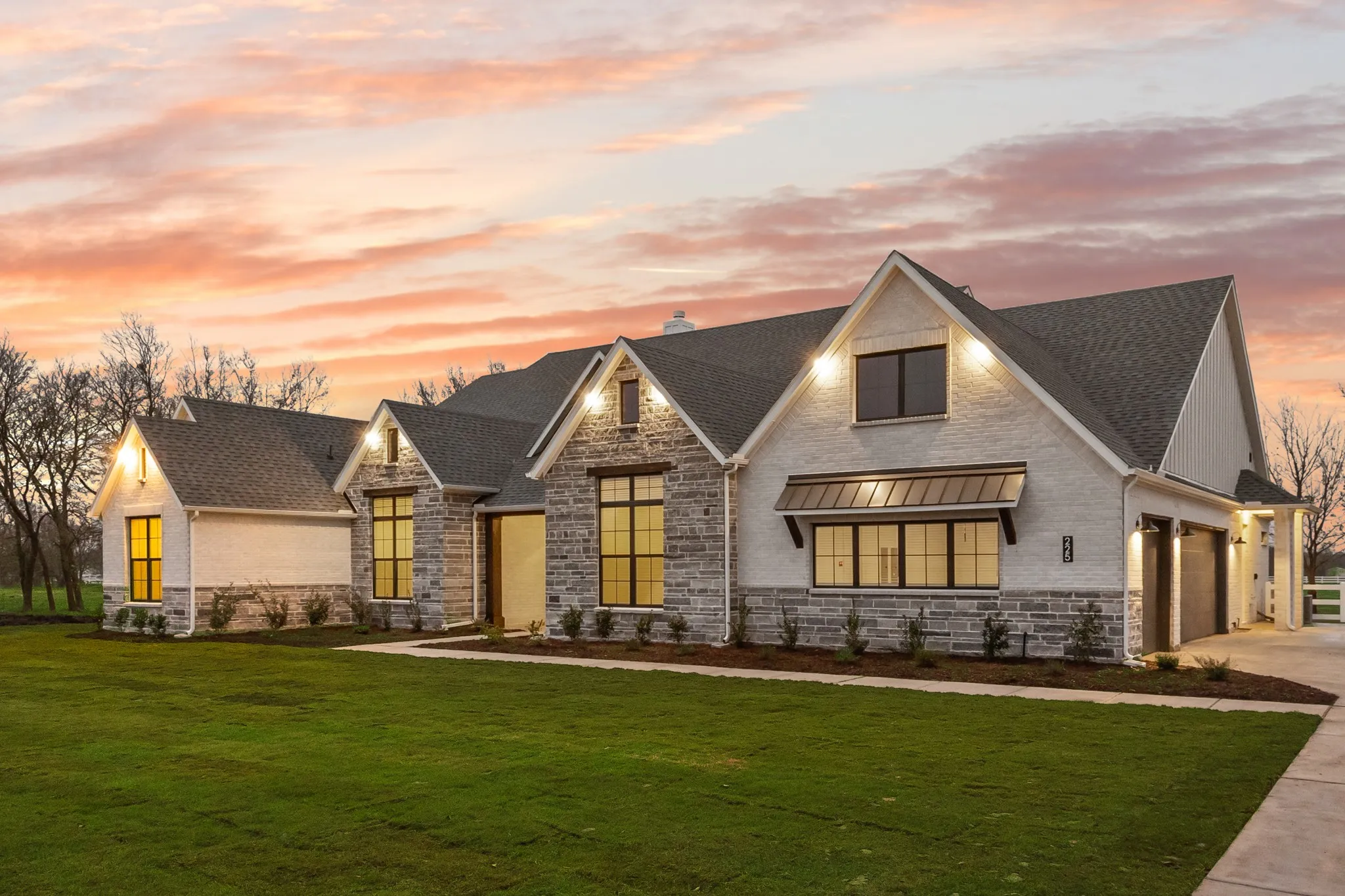 Custom Luxury Home built by Greenbrier Homes with Stone Accent on 2.5Acres!  Fenced backyard with White Vinyl Fencing!