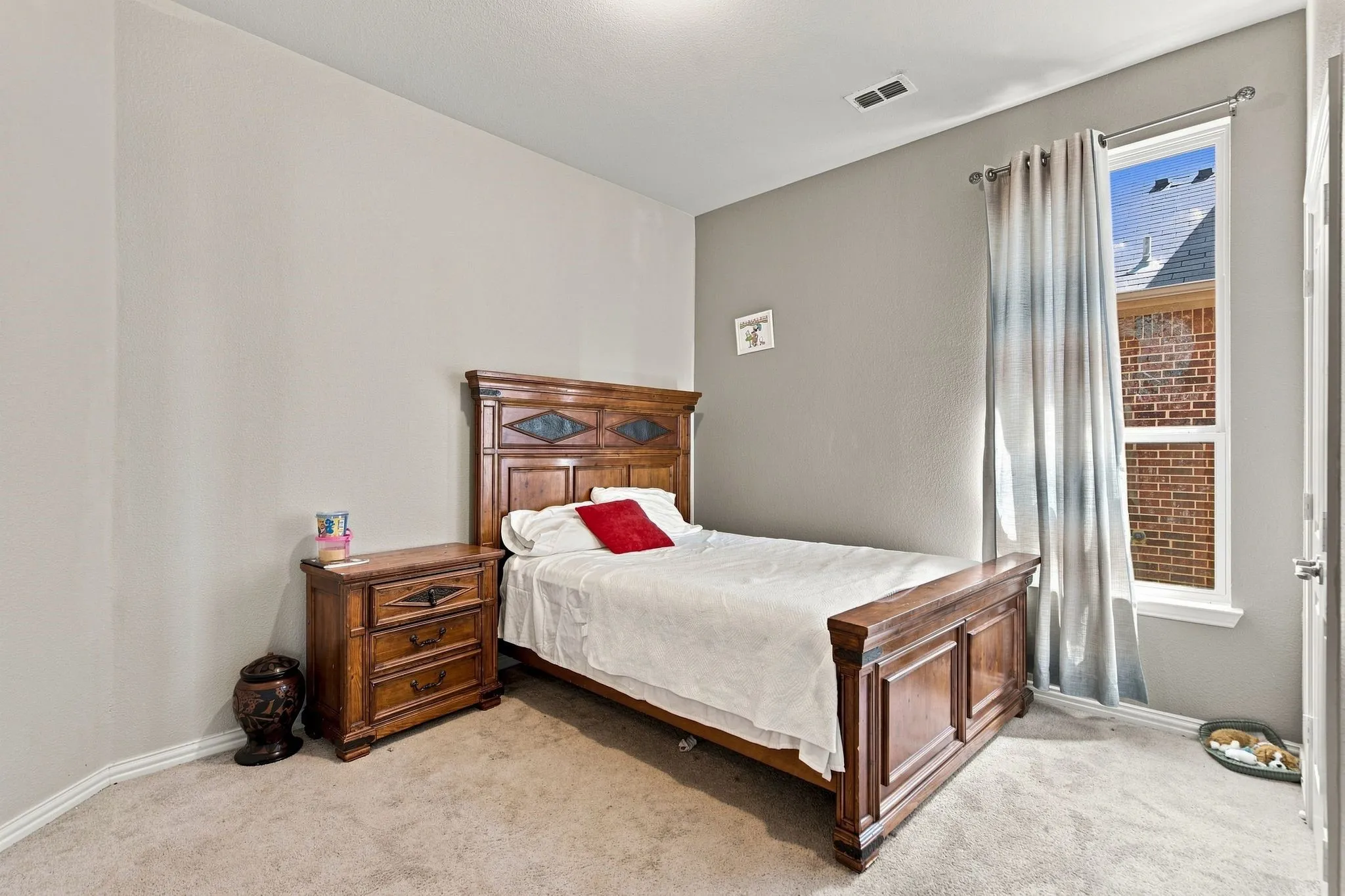 4th bedroom. Carpet flooring and light neutral wall colors