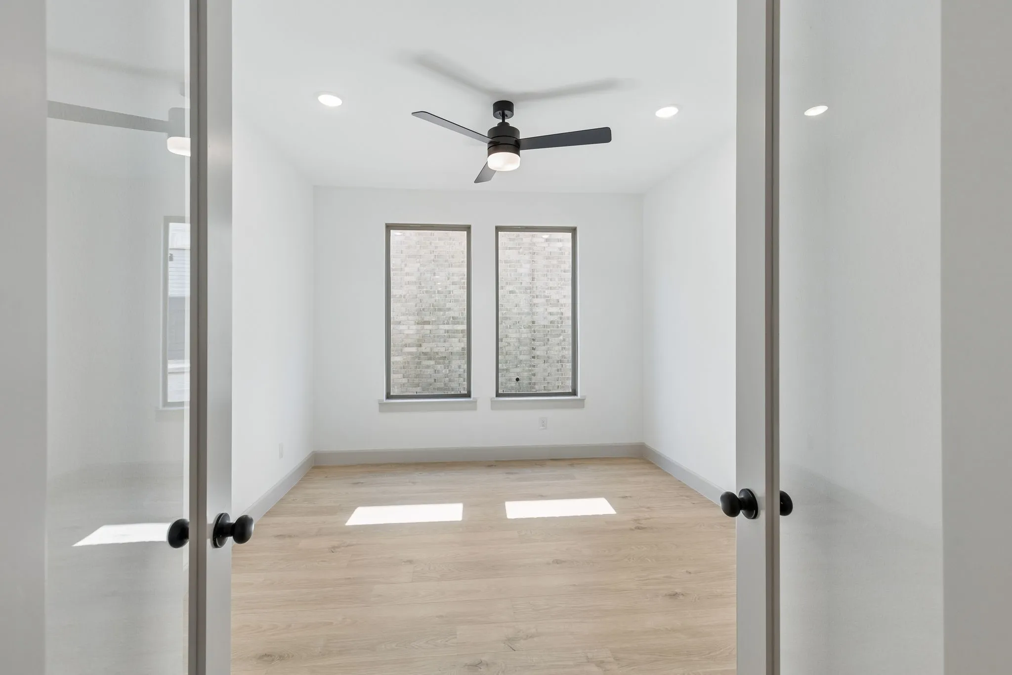 The professional working from home will appreciate the privacy this main floor home office provides.
