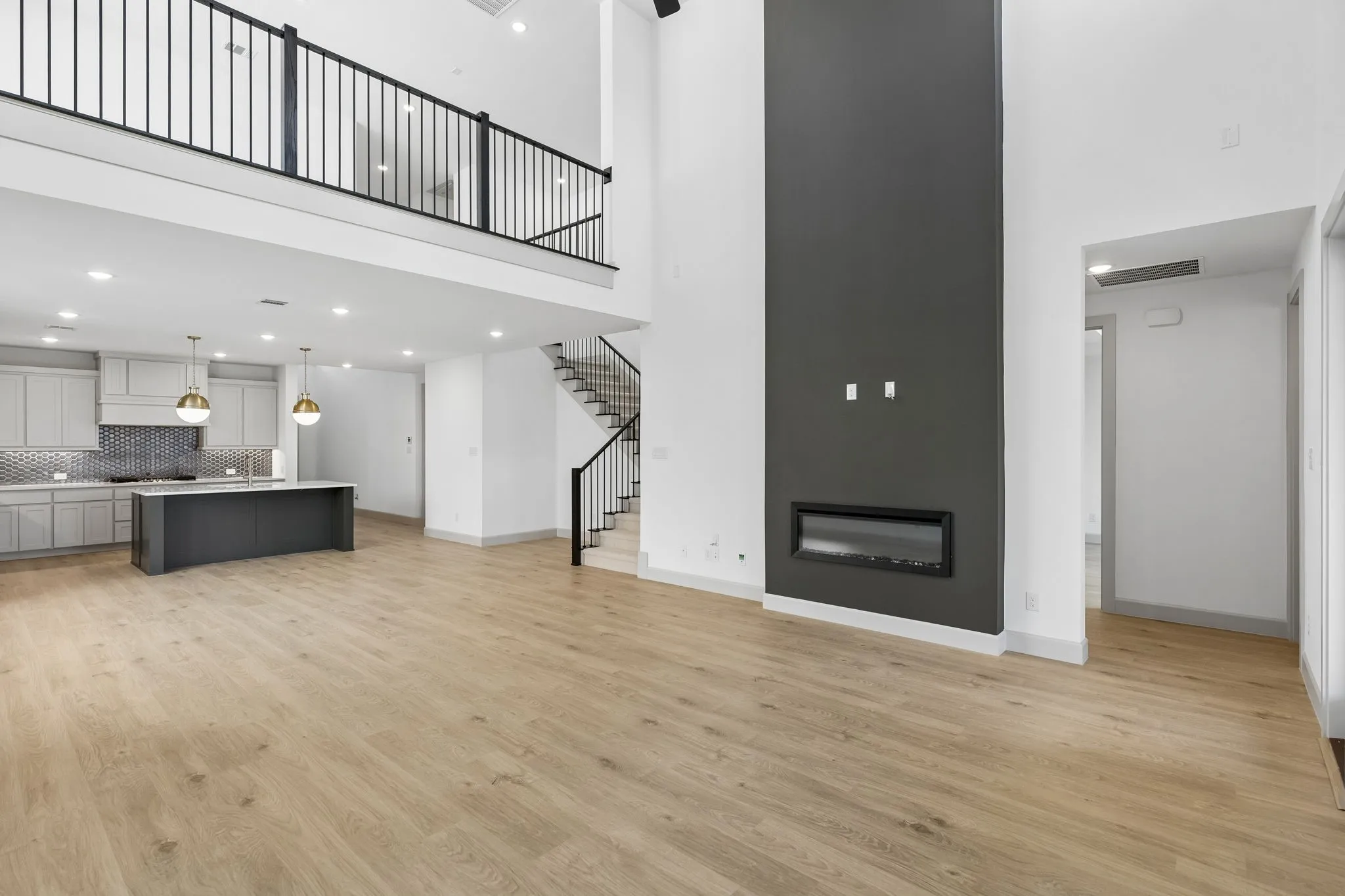 With the upstairs game room open to the main family room, you'll enjoy multi-level entertaining in our Percy plan.