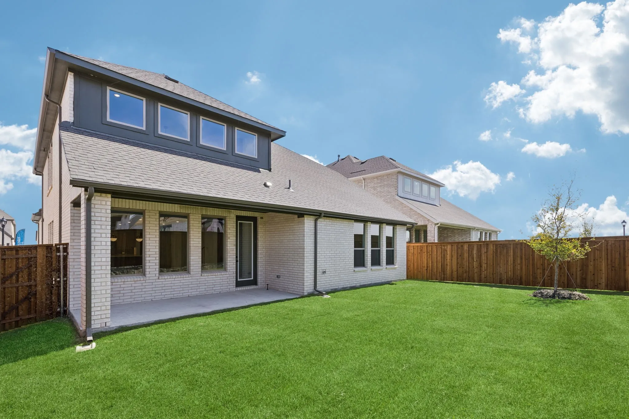 The entire family will enjoy endless outdoor fun times in this wonderful fenced back yard with covered patio!