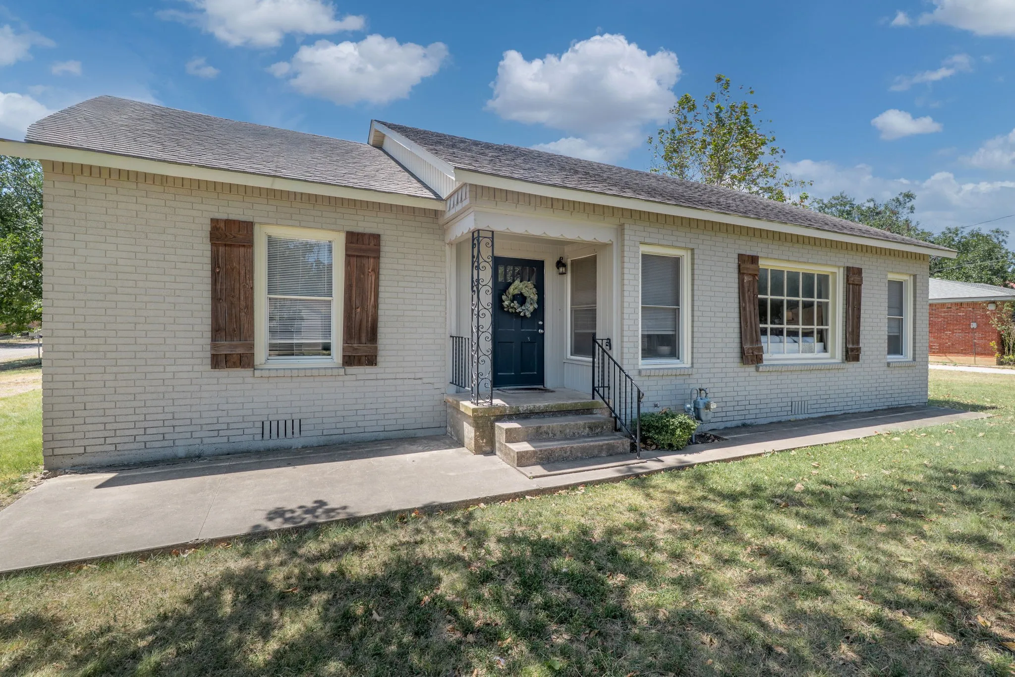 curb appeal of the corner lot and cottage style home