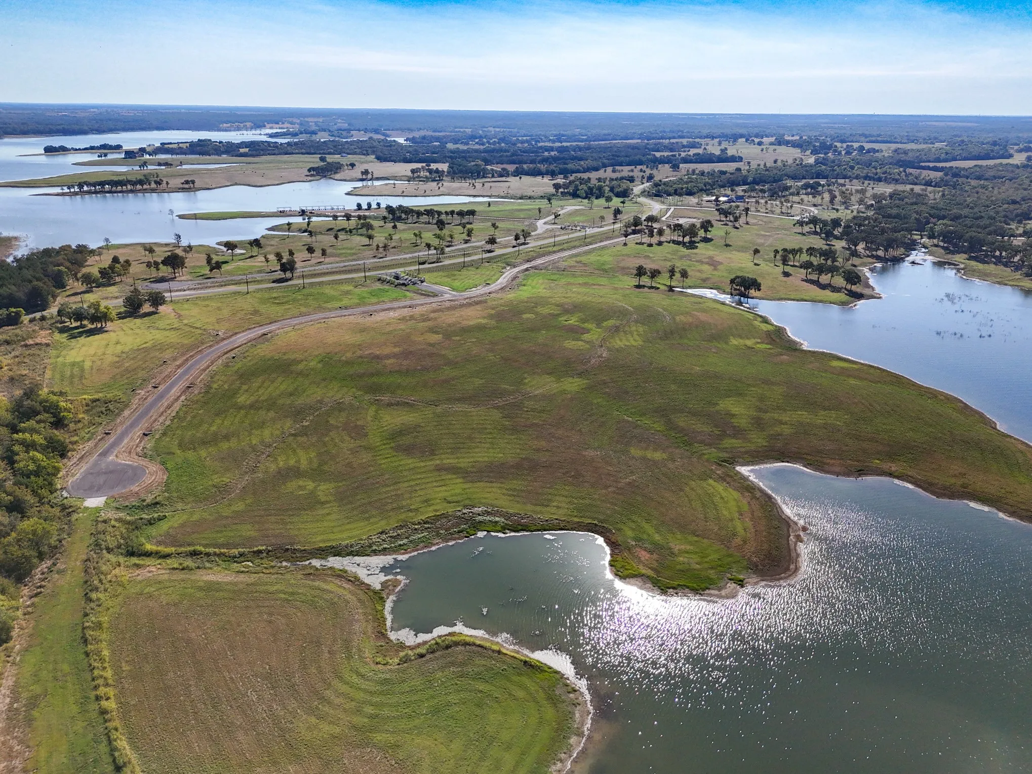 View of property location with a large body of water