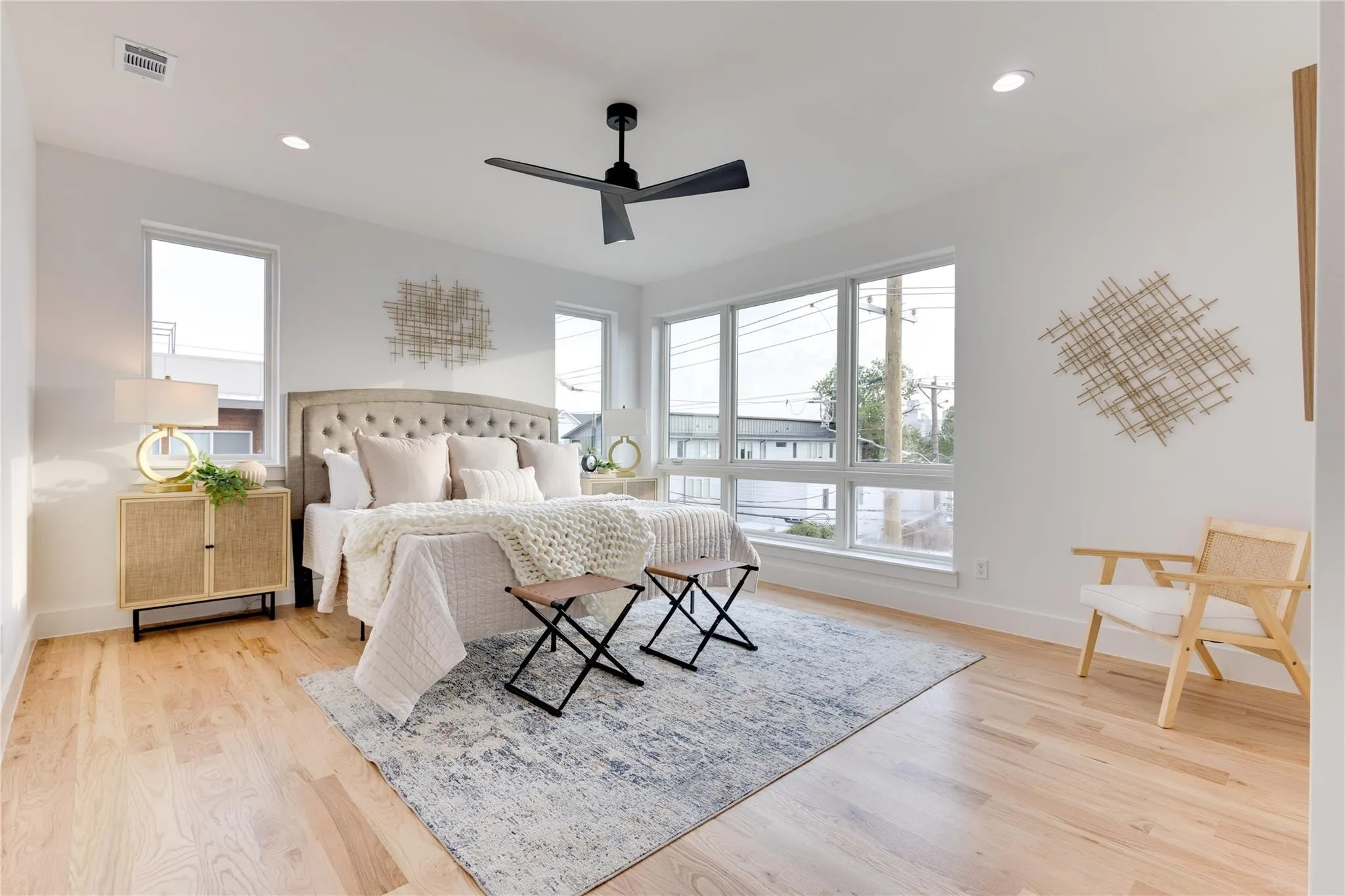 Bedroom featuring ceiling fan and light wood-type flooring