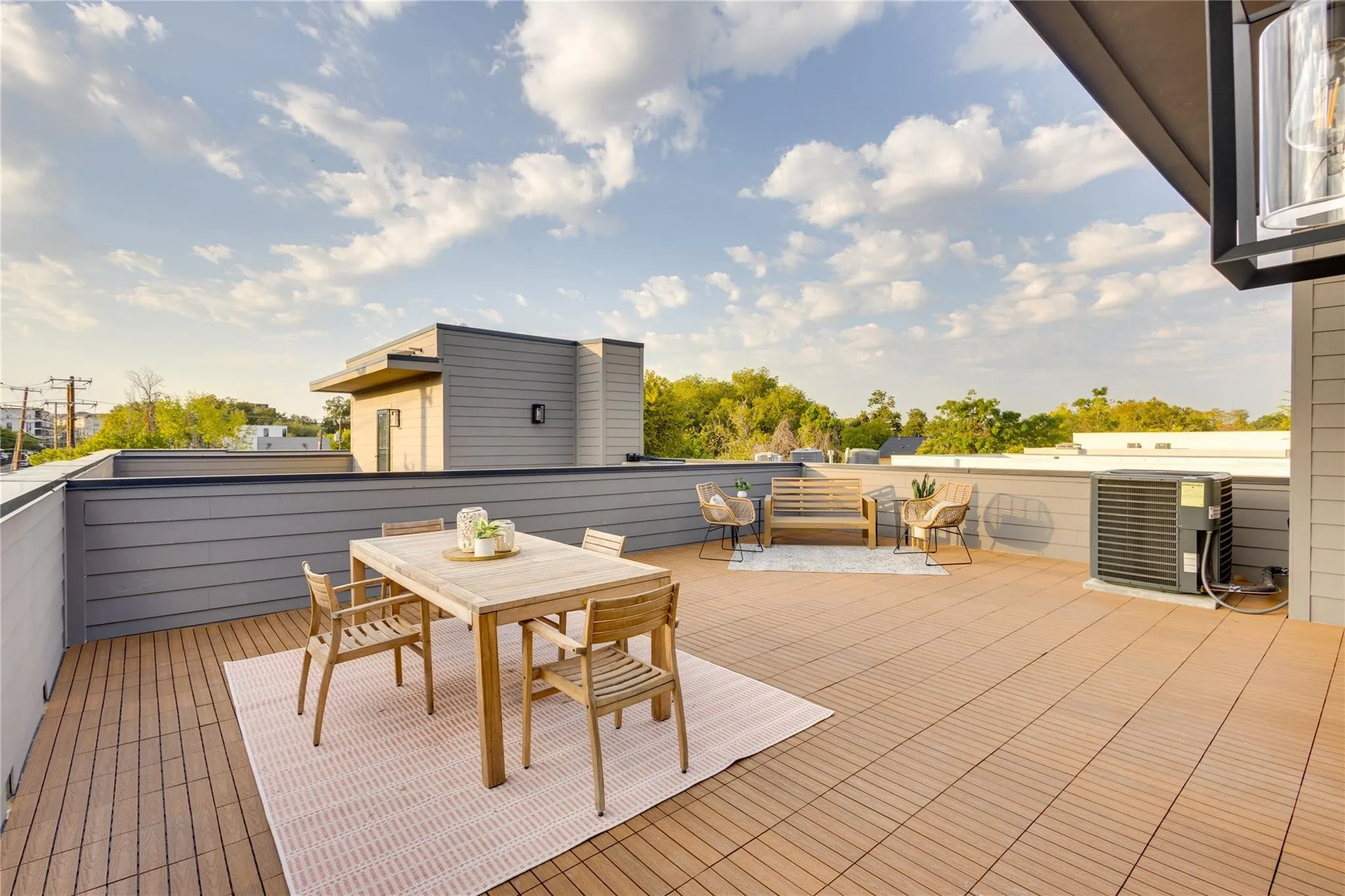 Deck featuring central air condition unit